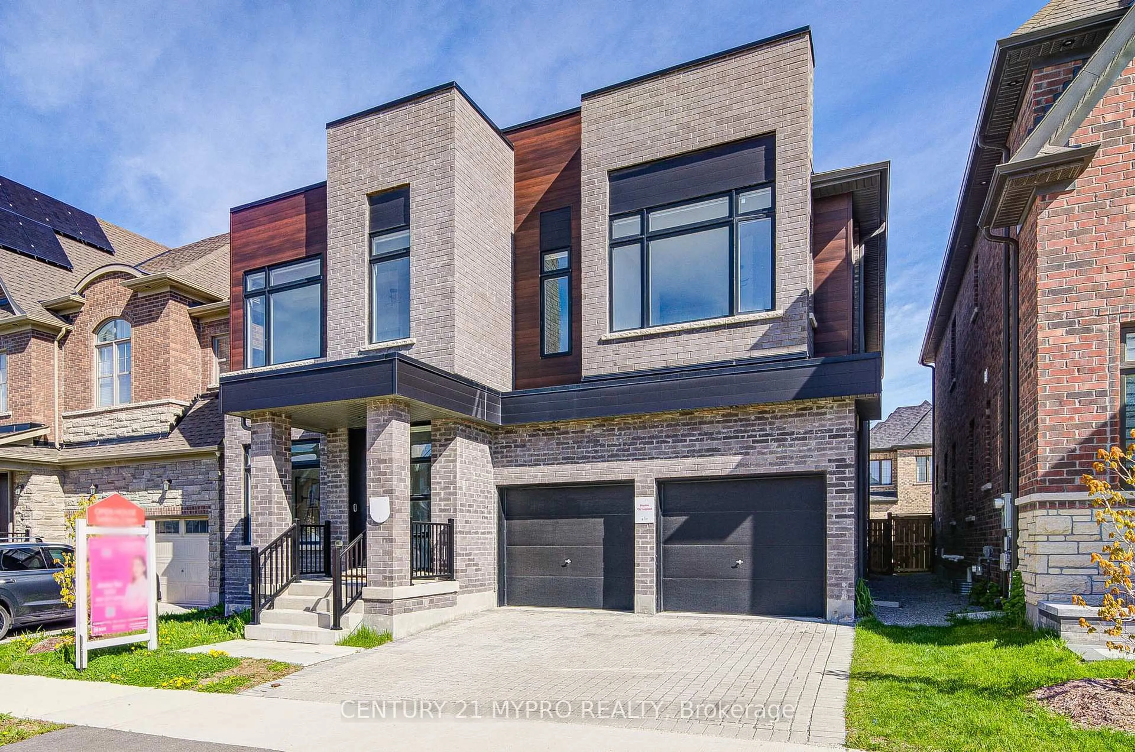 Home with brick exterior material, street for 12 Vanderbergh Ave, Markham Ontario L6C 3J2