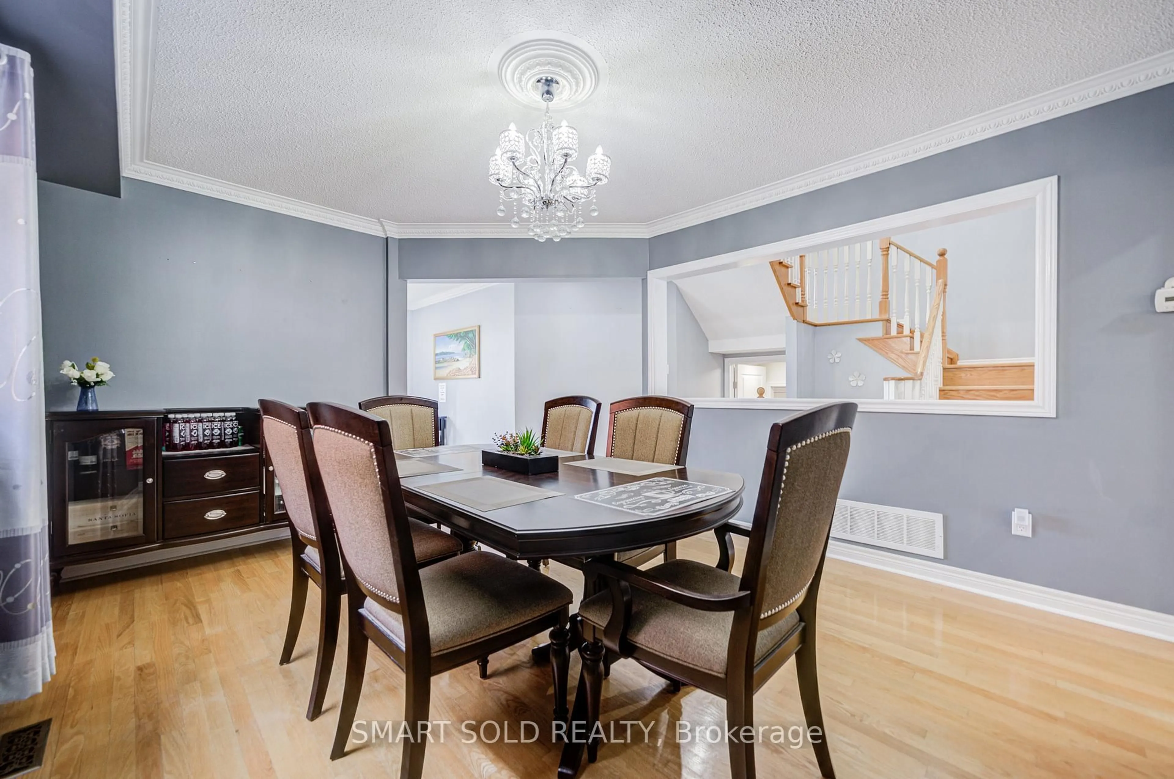 Dining room, wood/laminate floor for 72 Norbury Dr, Markham Ontario L3S 3V2
