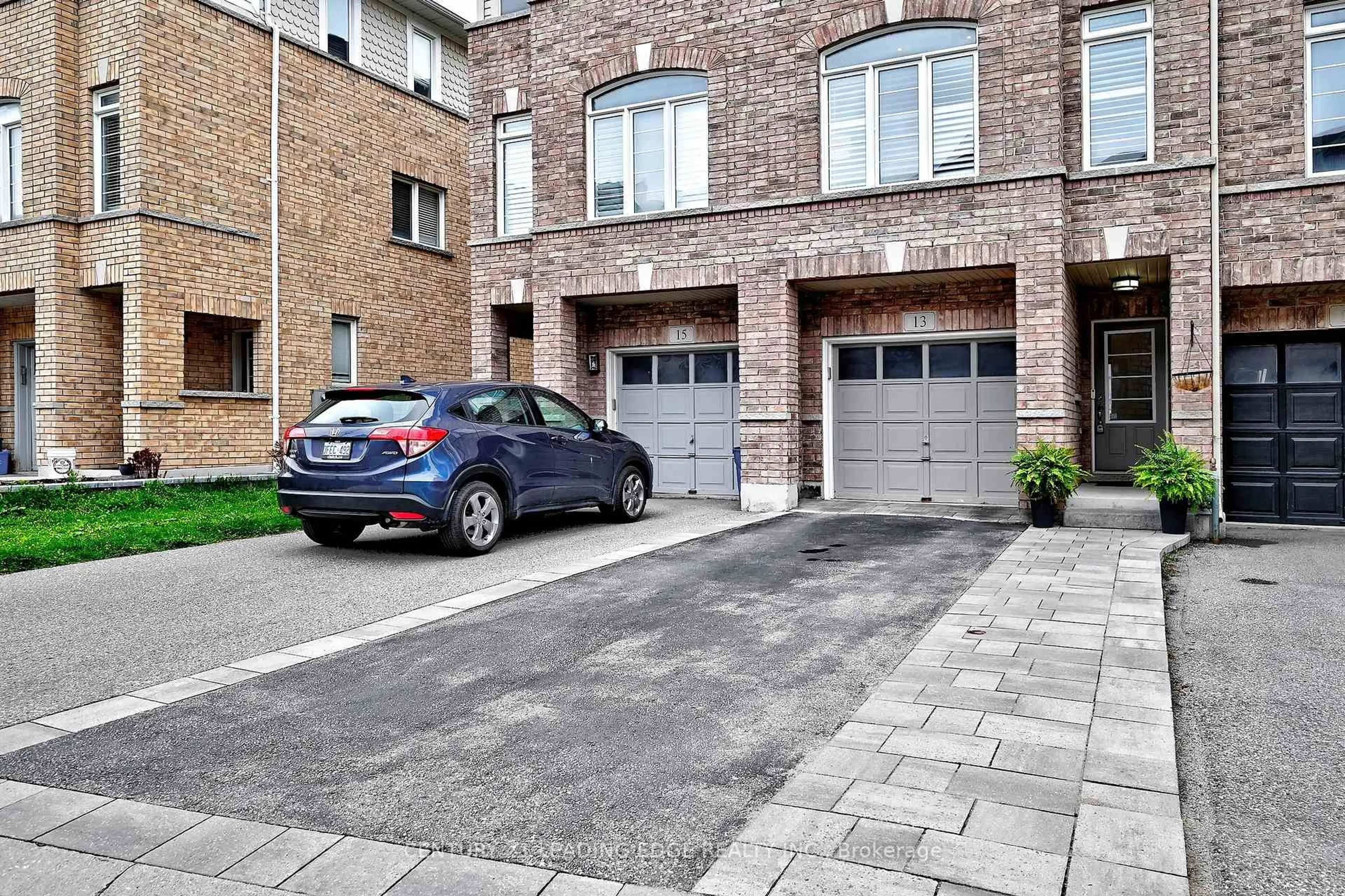 Home with brick exterior material, street for 13 Beehive Lane, Markham Ontario L6E 0K6