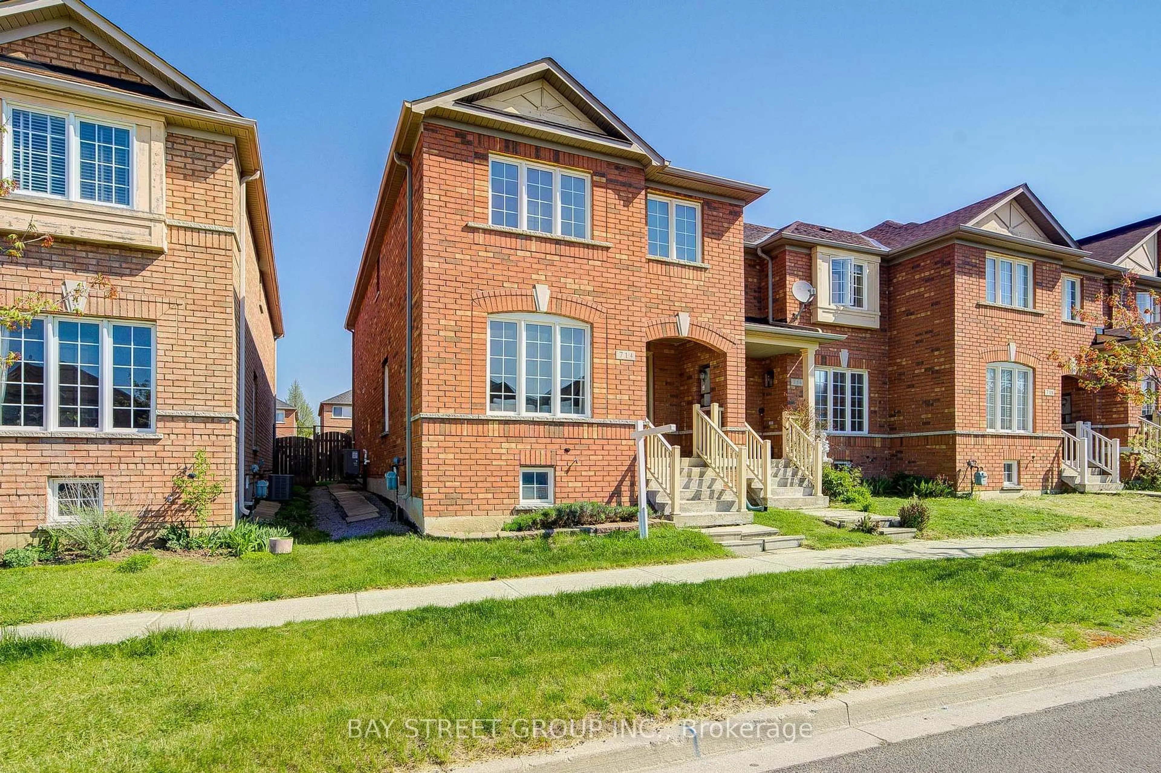 Home with brick exterior material, street for 714 Castlemore Ave, Markham Ontario L6E 1M9