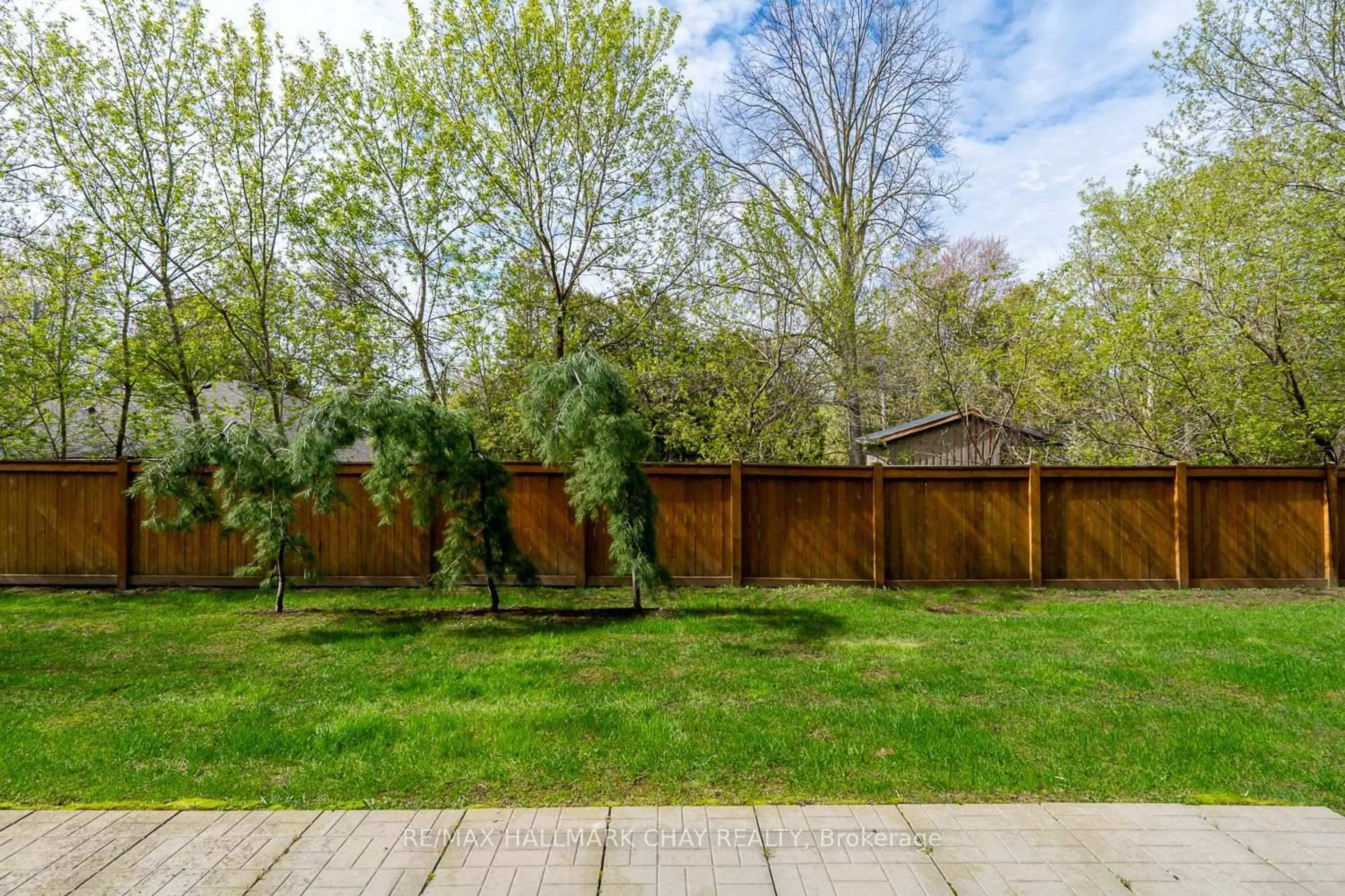 Patio, forest/trees view for 69 Boyne St #103, New Tecumseth Ontario L9R 0N5