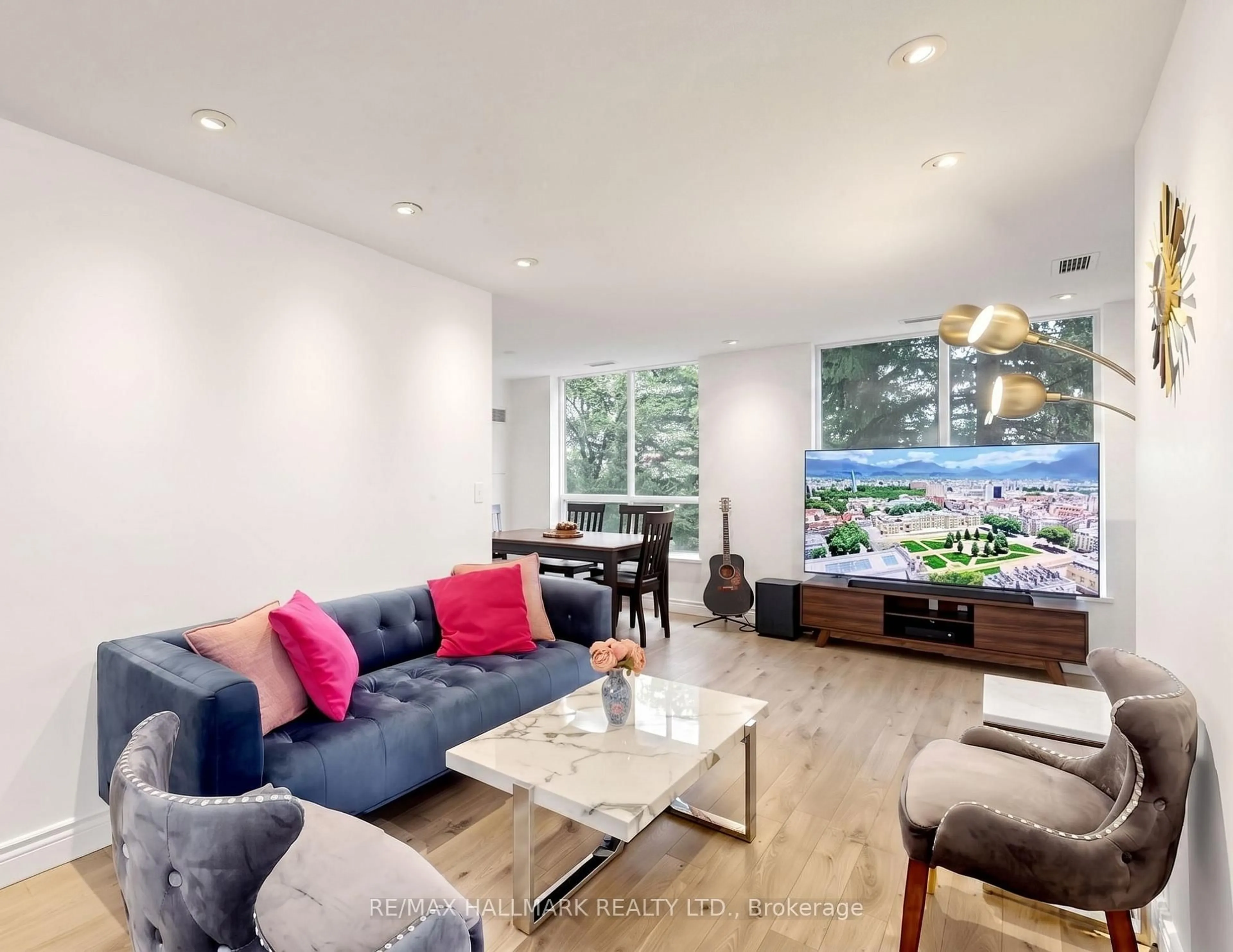 Living room with furniture, wood/laminate floor for 3 Ellesmere St #106, Richmond Hill Ontario L4B 4N2