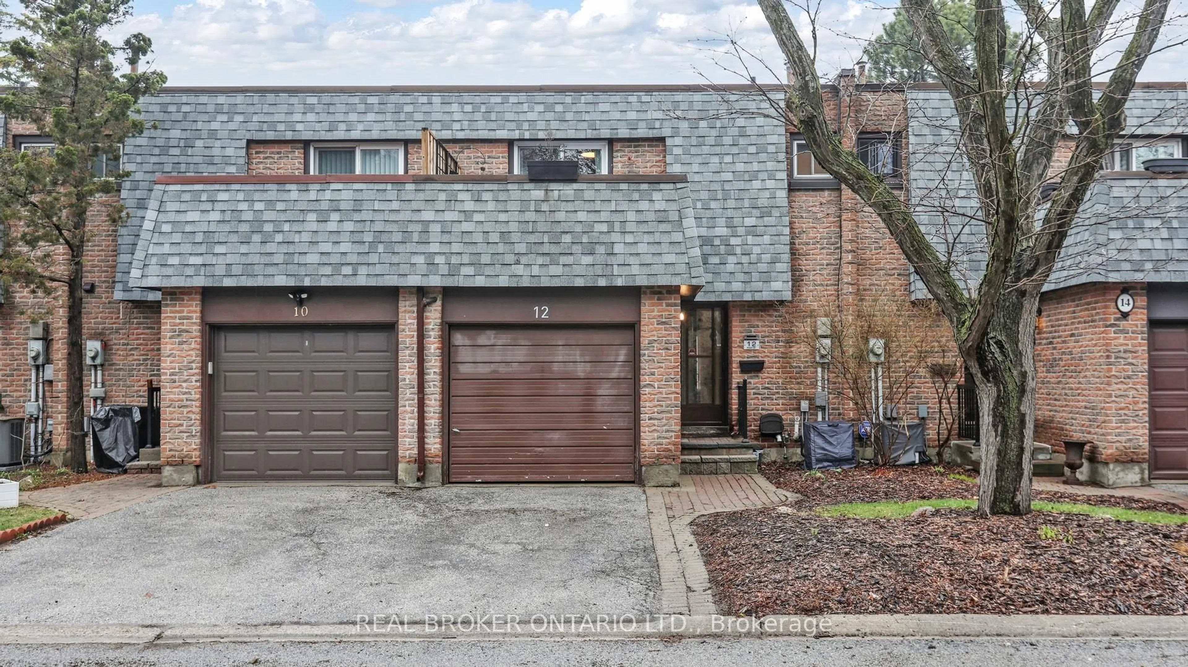 Home with brick exterior material, street for 12 Woodglen Way, Markham Ontario L3R 3A8