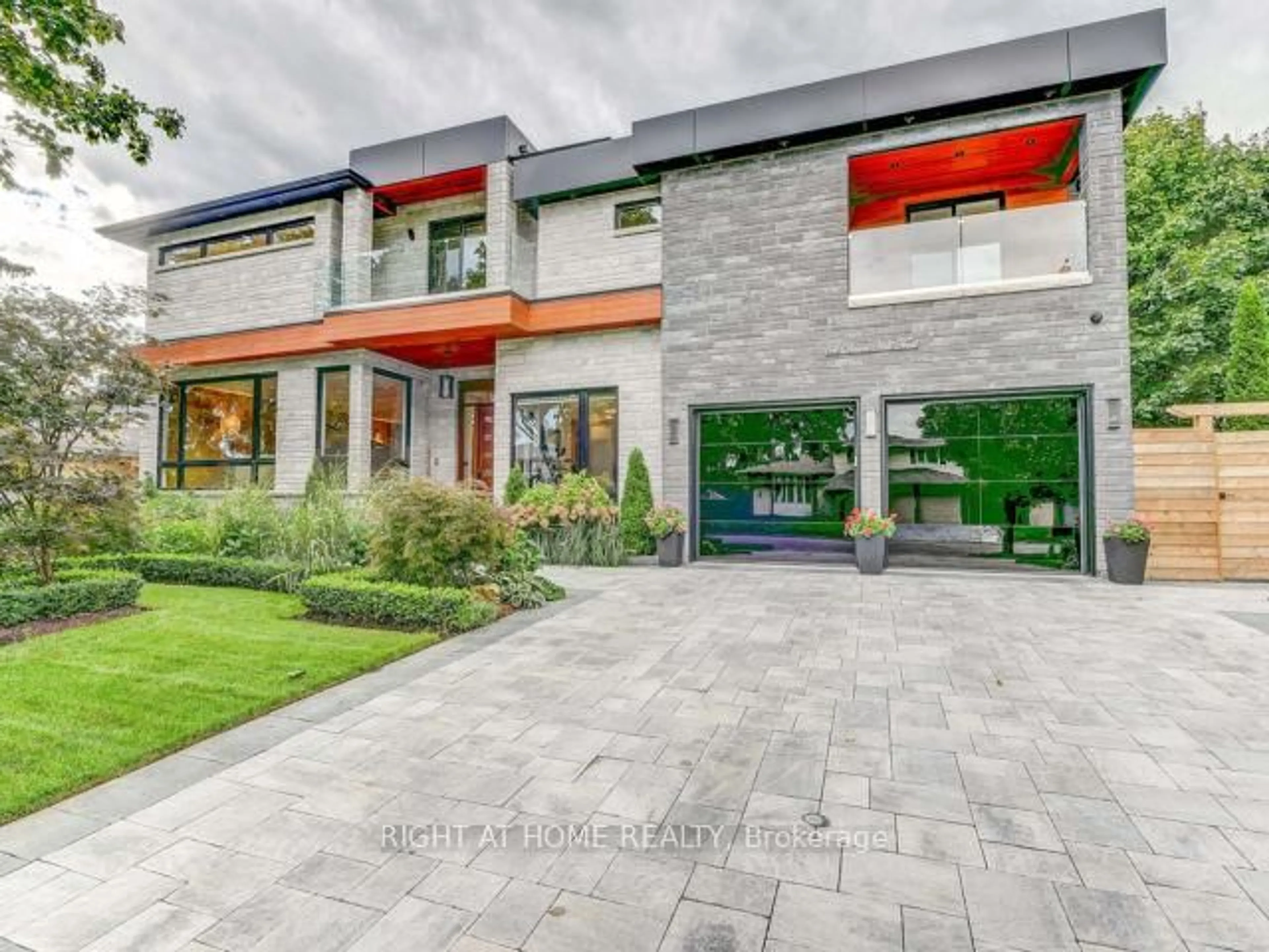 Home with brick exterior material, street for 54 Dawn Hill Tr, Markham Ontario L3T 3B2