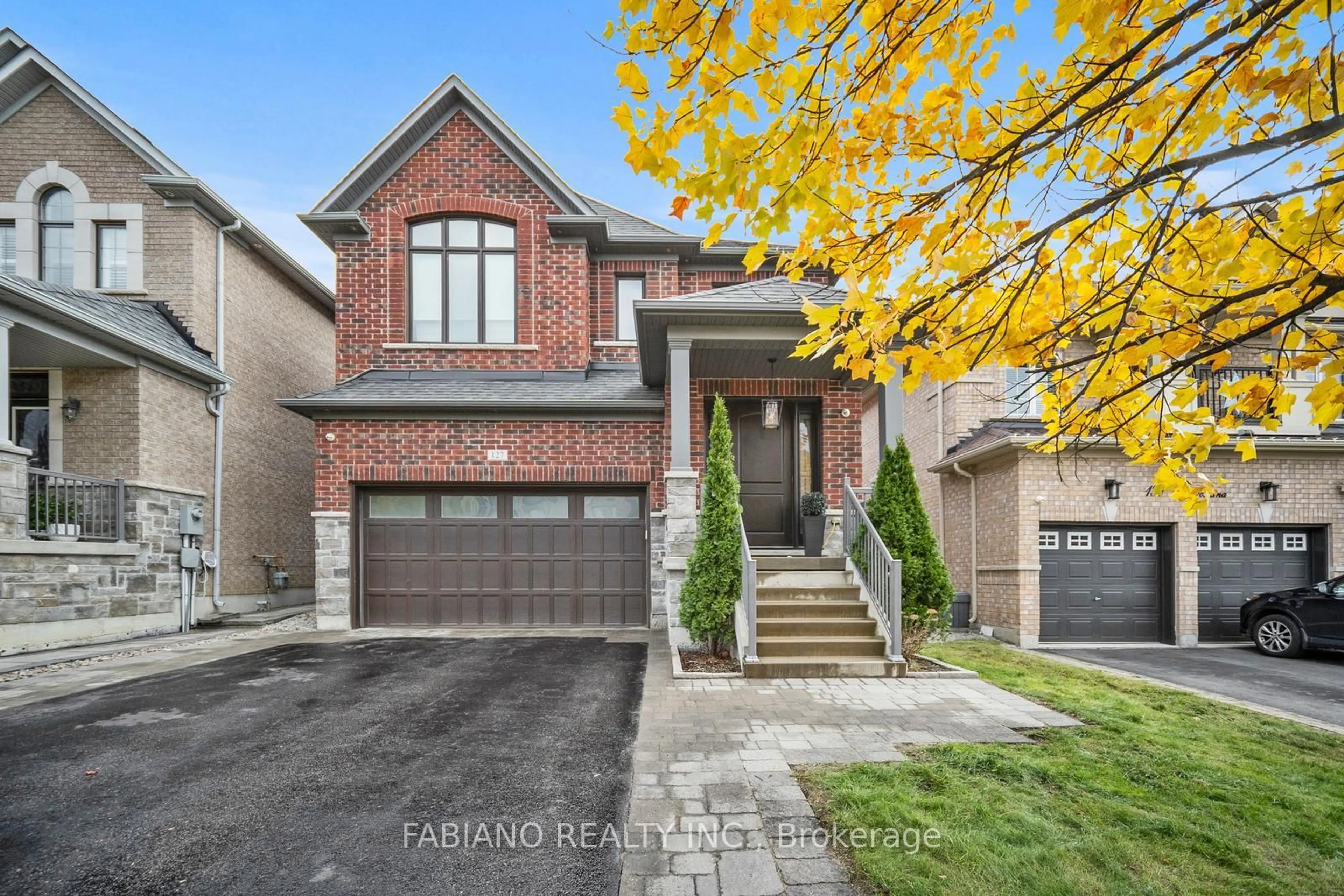 Home with brick exterior material, street for 127 Via Toscana, Vaughan Ontario L4H 3C1