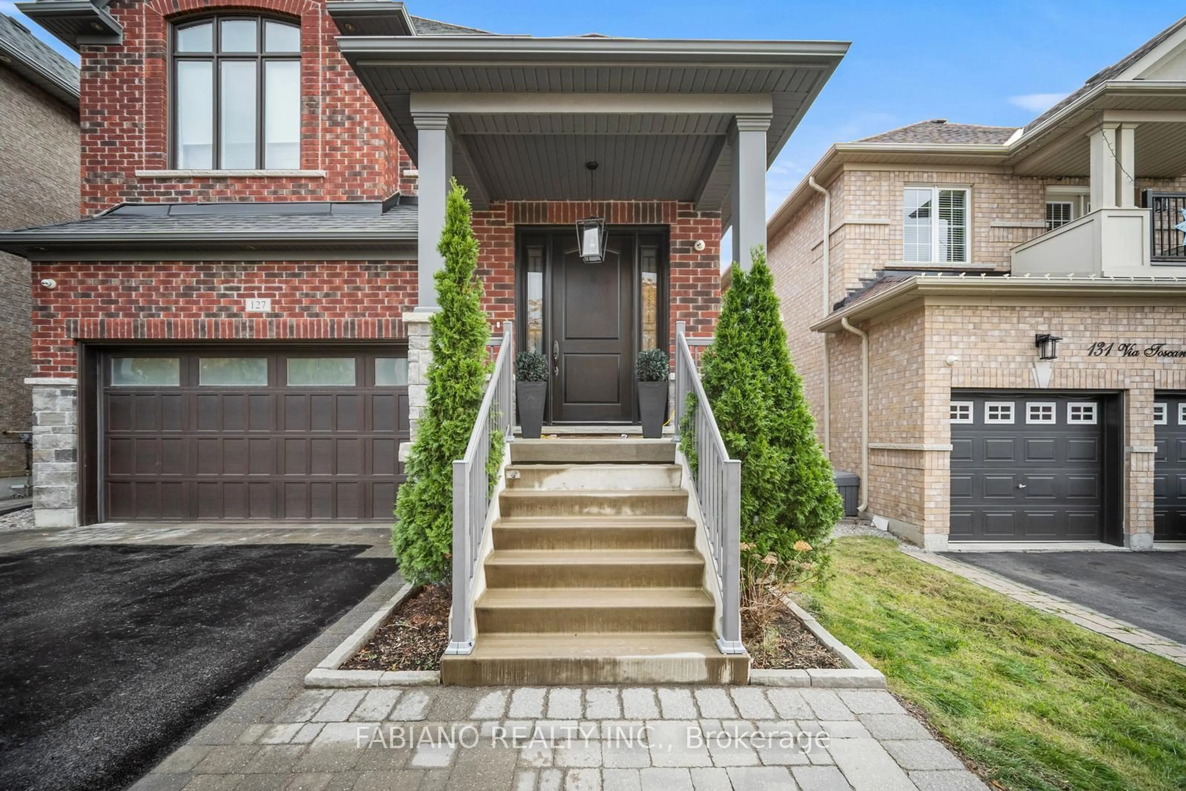 Home with brick exterior material, street for 127 Via Toscana, Vaughan Ontario L4H 3C1