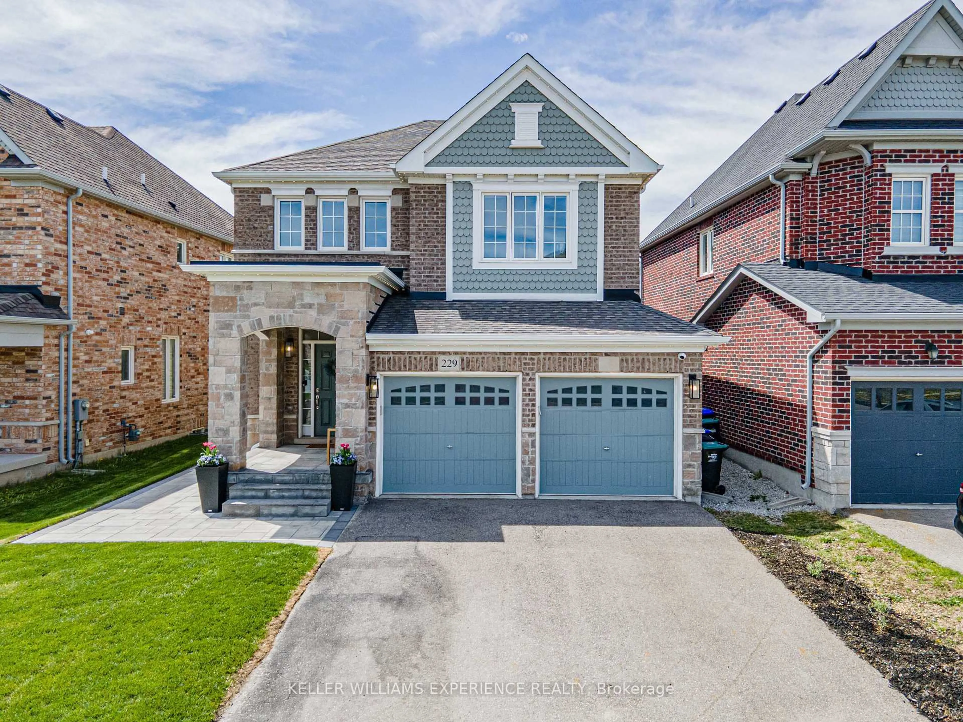 Home with brick exterior material, street for 229 Blue Dasher Blvd, Bradford West Gwillimbury Ontario L3Z 4H8