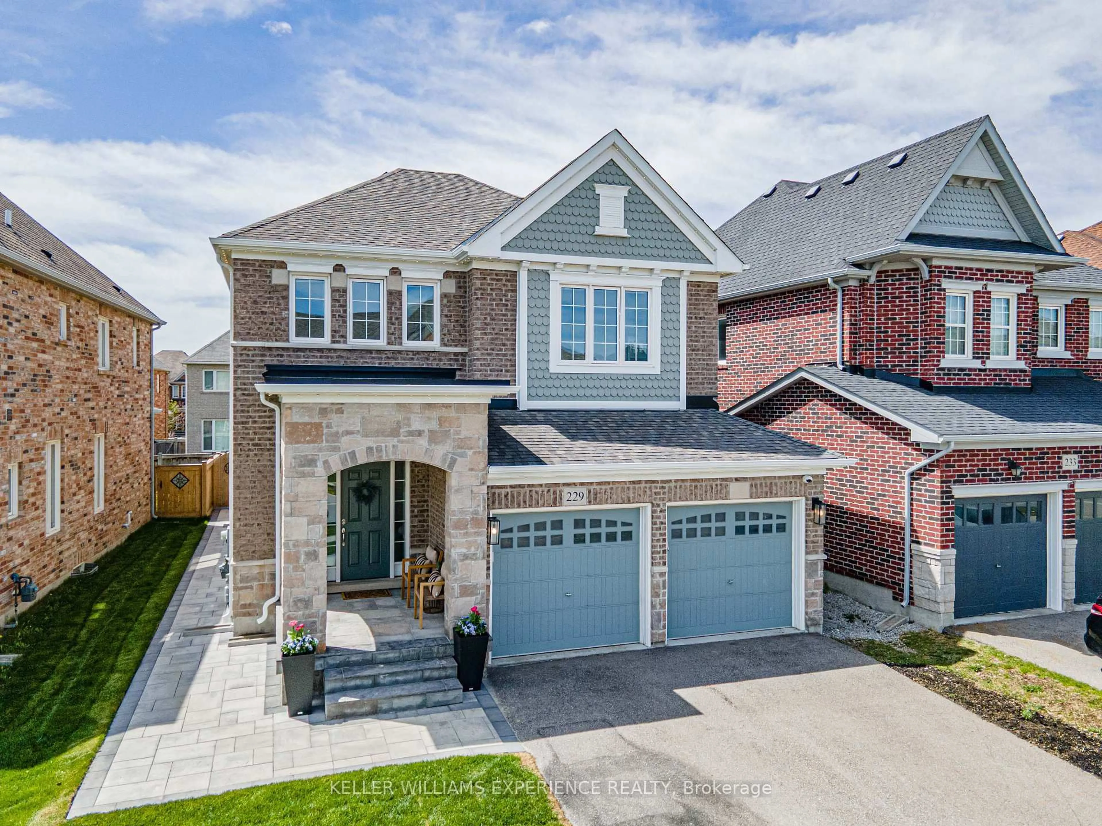 Home with brick exterior material, street for 229 Blue Dasher Blvd, Bradford West Gwillimbury Ontario L3Z 4H8