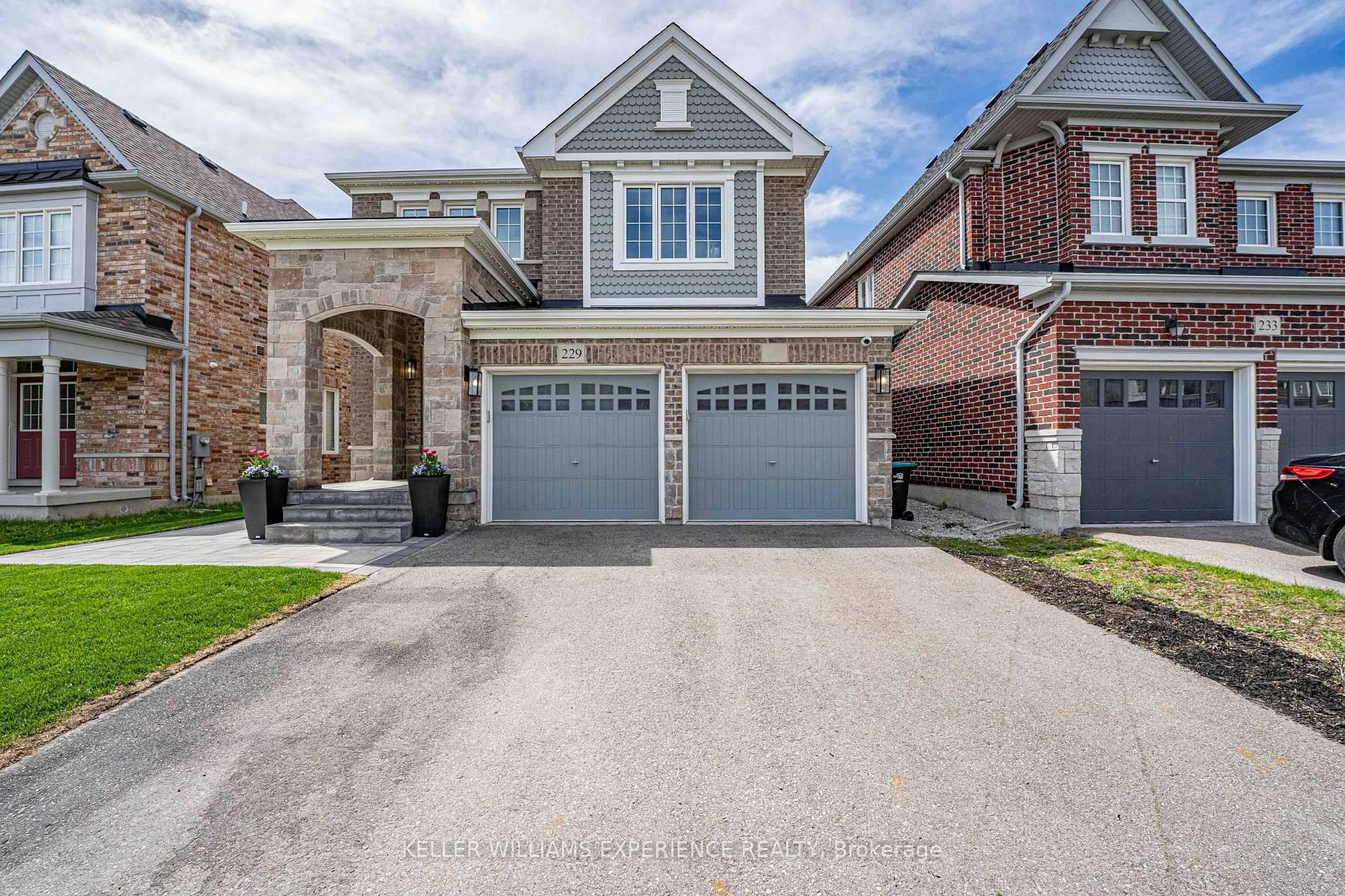 Home with brick exterior material, street for 229 Blue Dasher Blvd, Bradford West Gwillimbury Ontario L3Z 4H8
