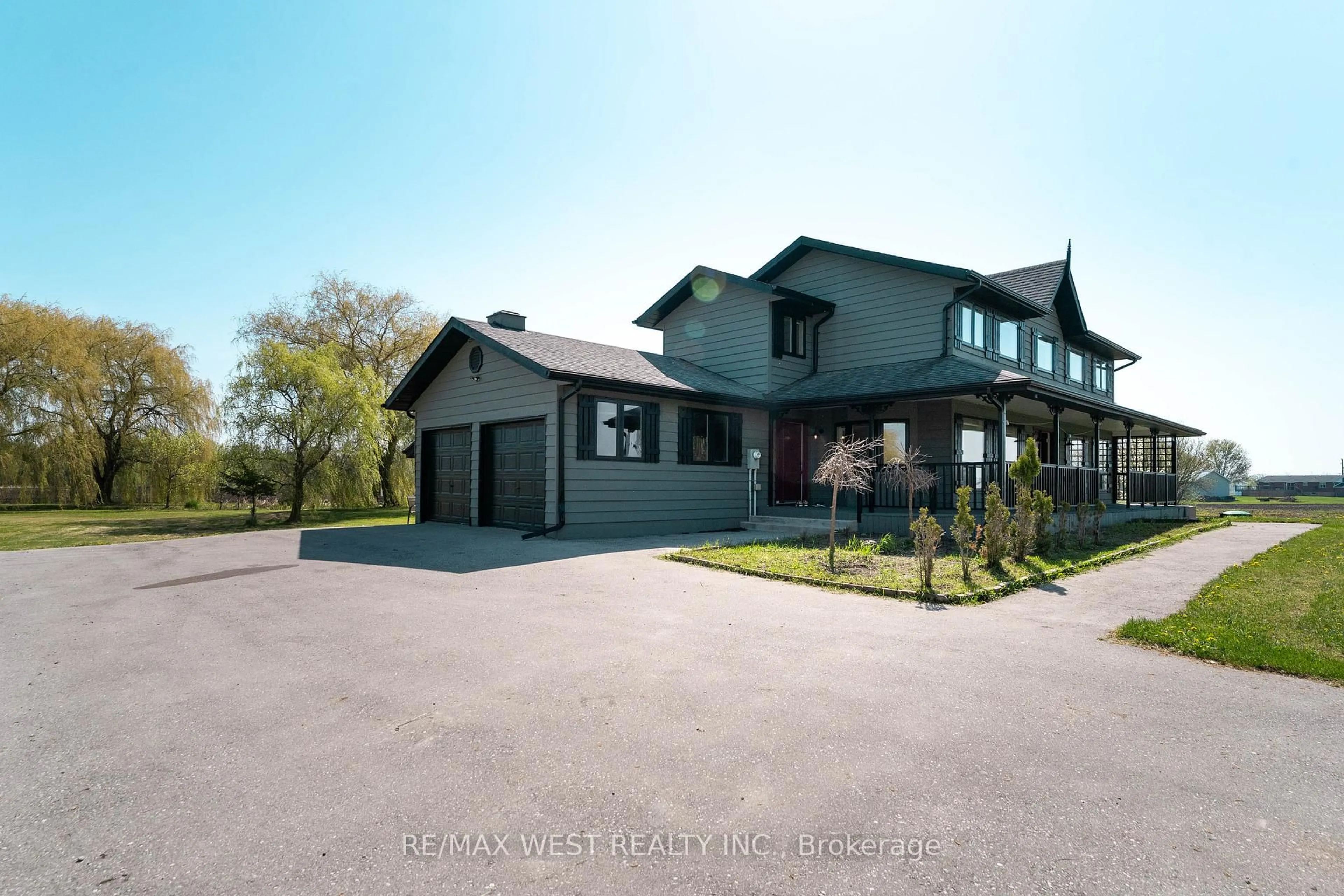A pic from outside/outdoor area/front of a property/back of a property/a pic from drone, street for 3561 15th Side Rd, New Tecumseth Ontario L0G 1A0