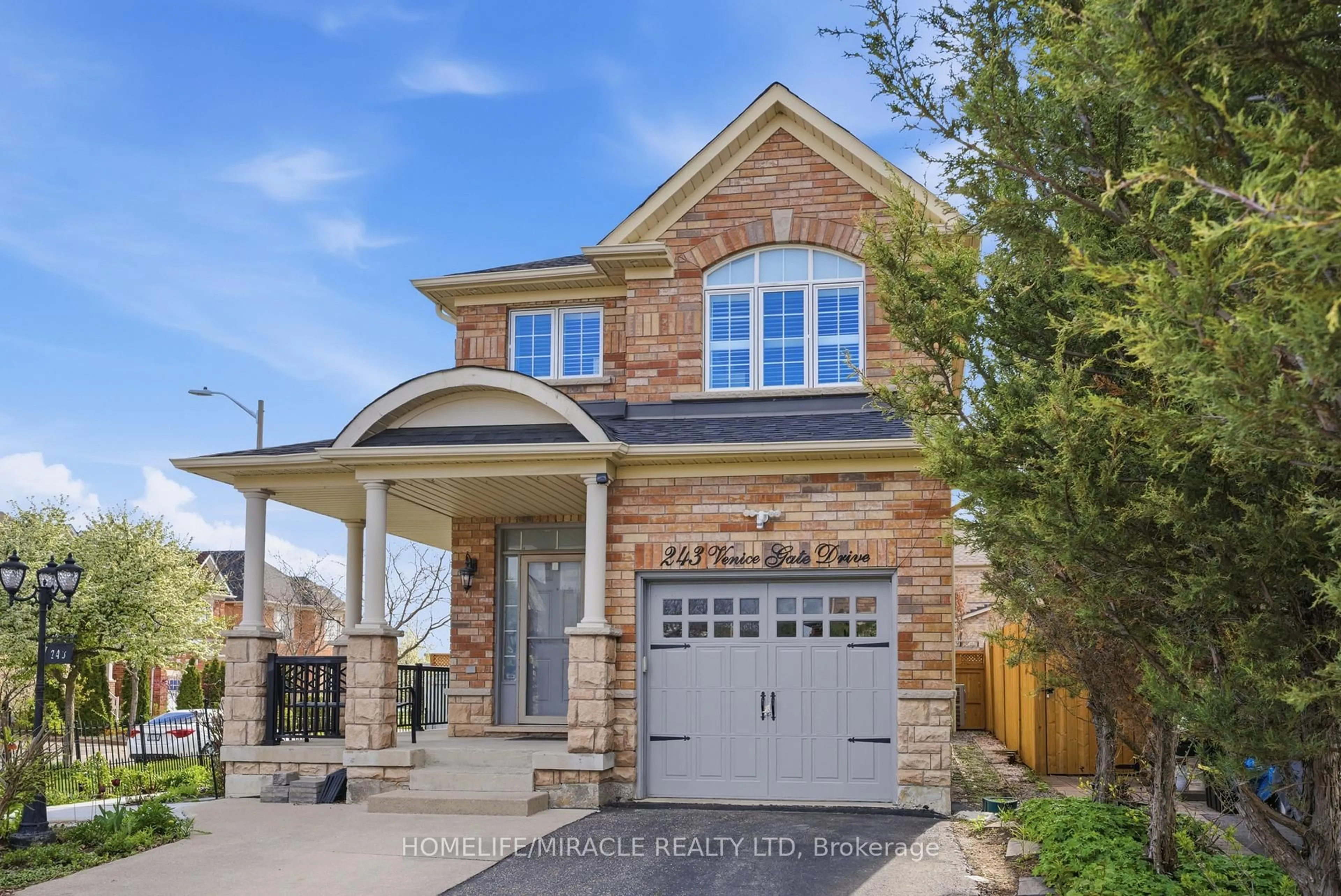 Home with brick exterior material, street for 243 Venice Gate Dr, Vaughan Ontario L4H 0G1