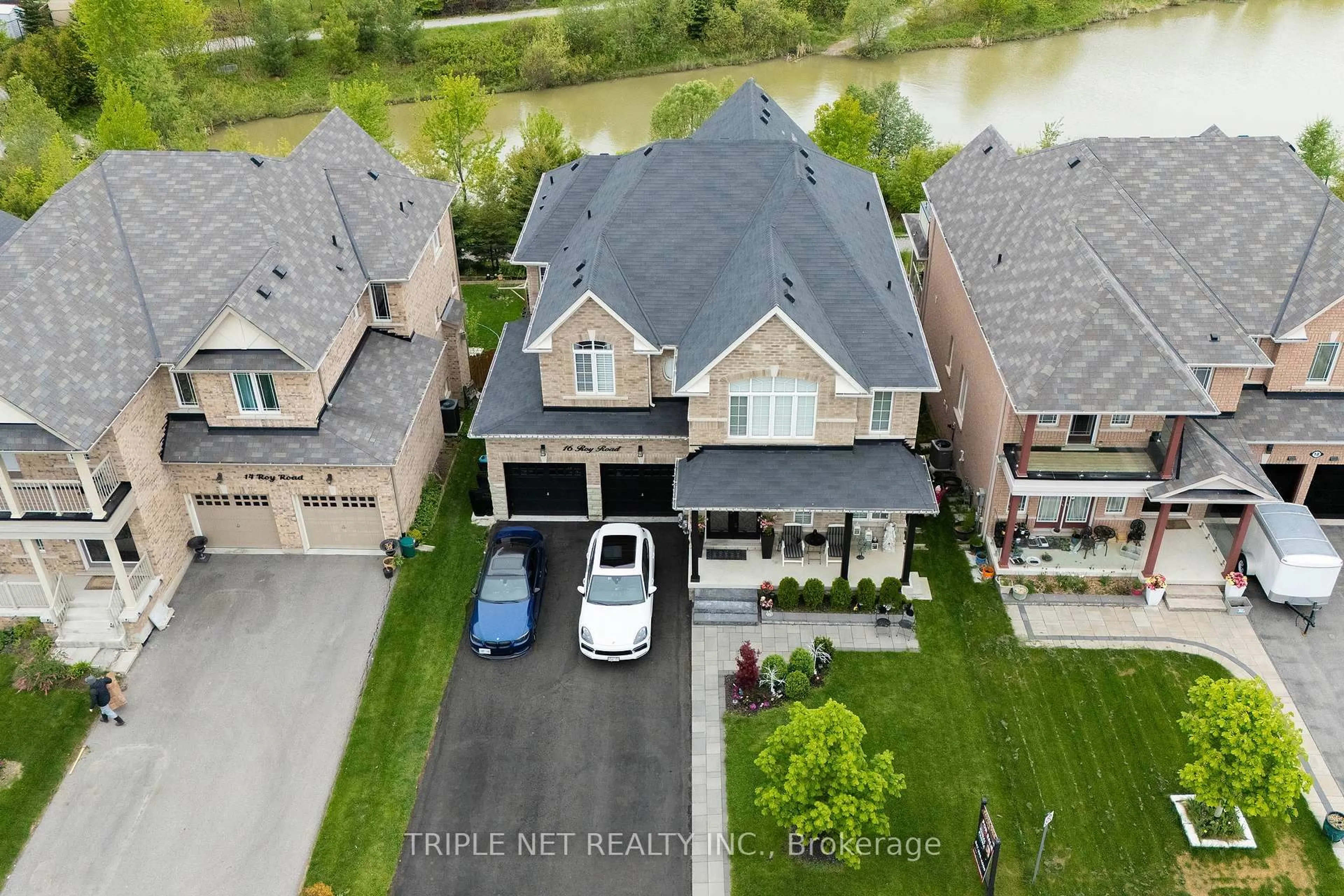 A pic from outside/outdoor area/front of a property/back of a property/a pic from drone, street for 16 Roy Rd, New Tecumseth Ontario L0G 1W0