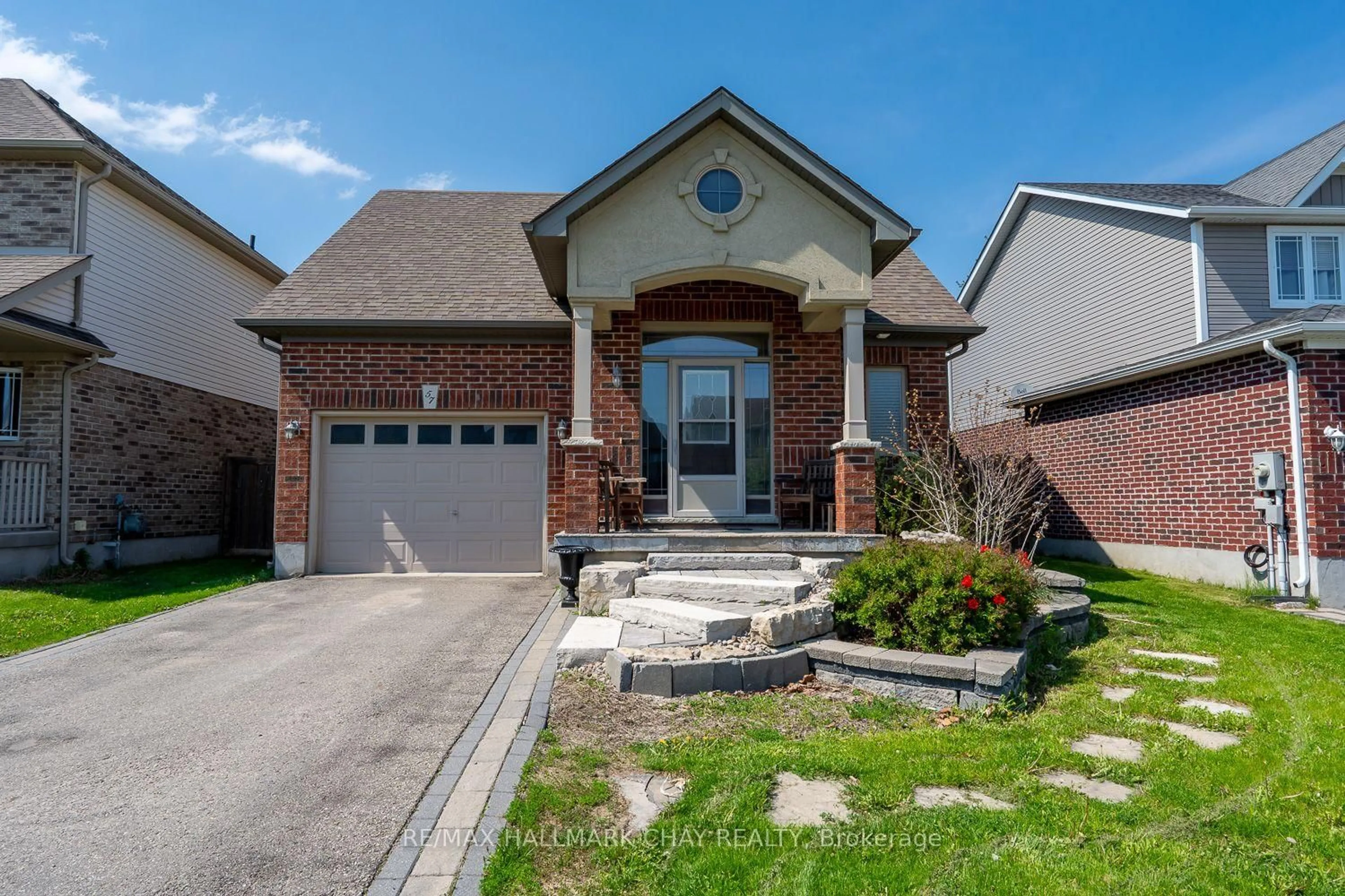 Home with brick exterior material, street for 57 Irwin Cres, New Tecumseth Ontario L9R 0G6
