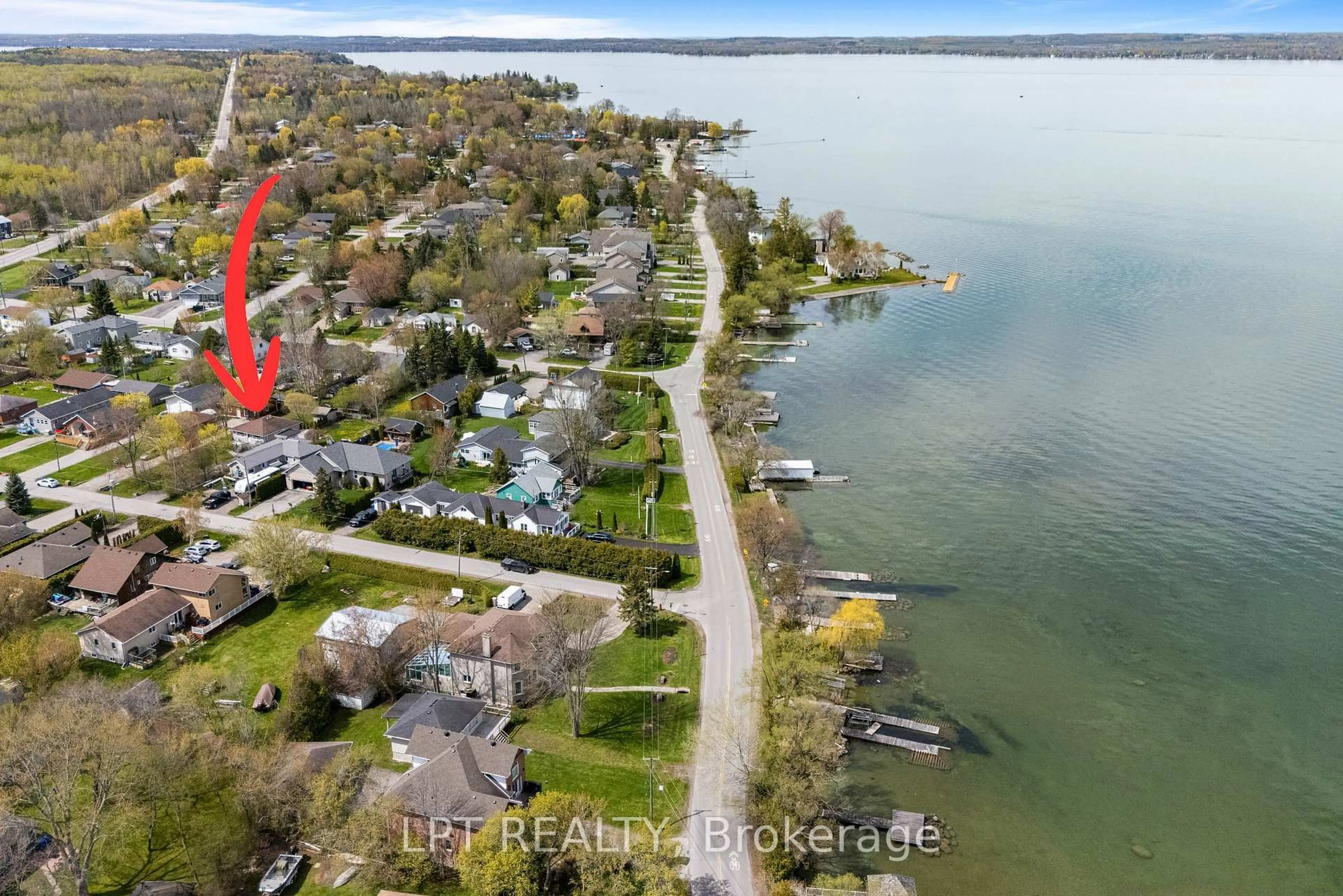 A pic from outside/outdoor area/front of a property/back of a property/a pic from drone, water/lake/river/ocean view for 818 Poplar Ave, Georgina Ontario L4P 3E9