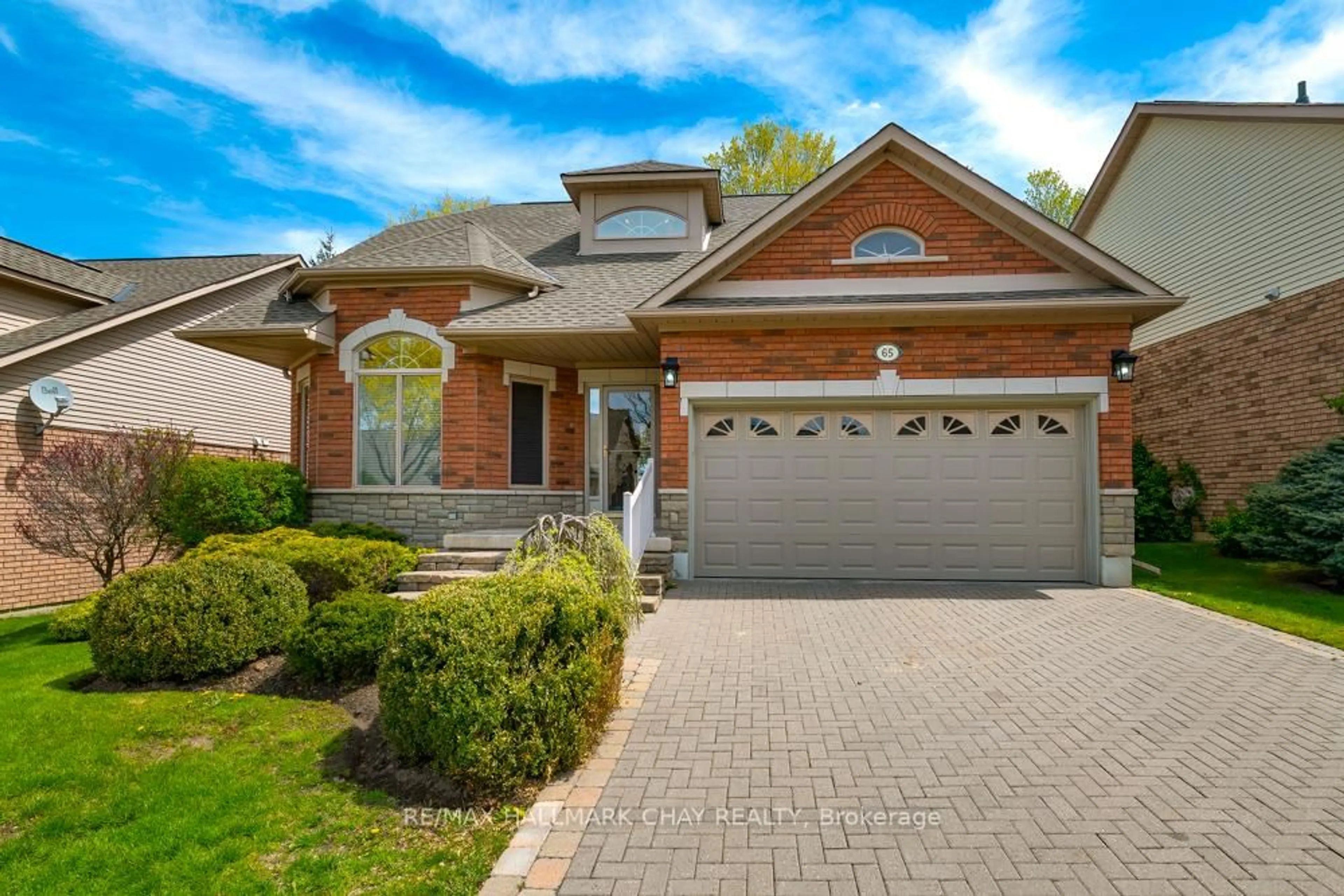 Home with brick exterior material, street for 65 Sunset Blvd, New Tecumseth Ontario L9R 1Y8