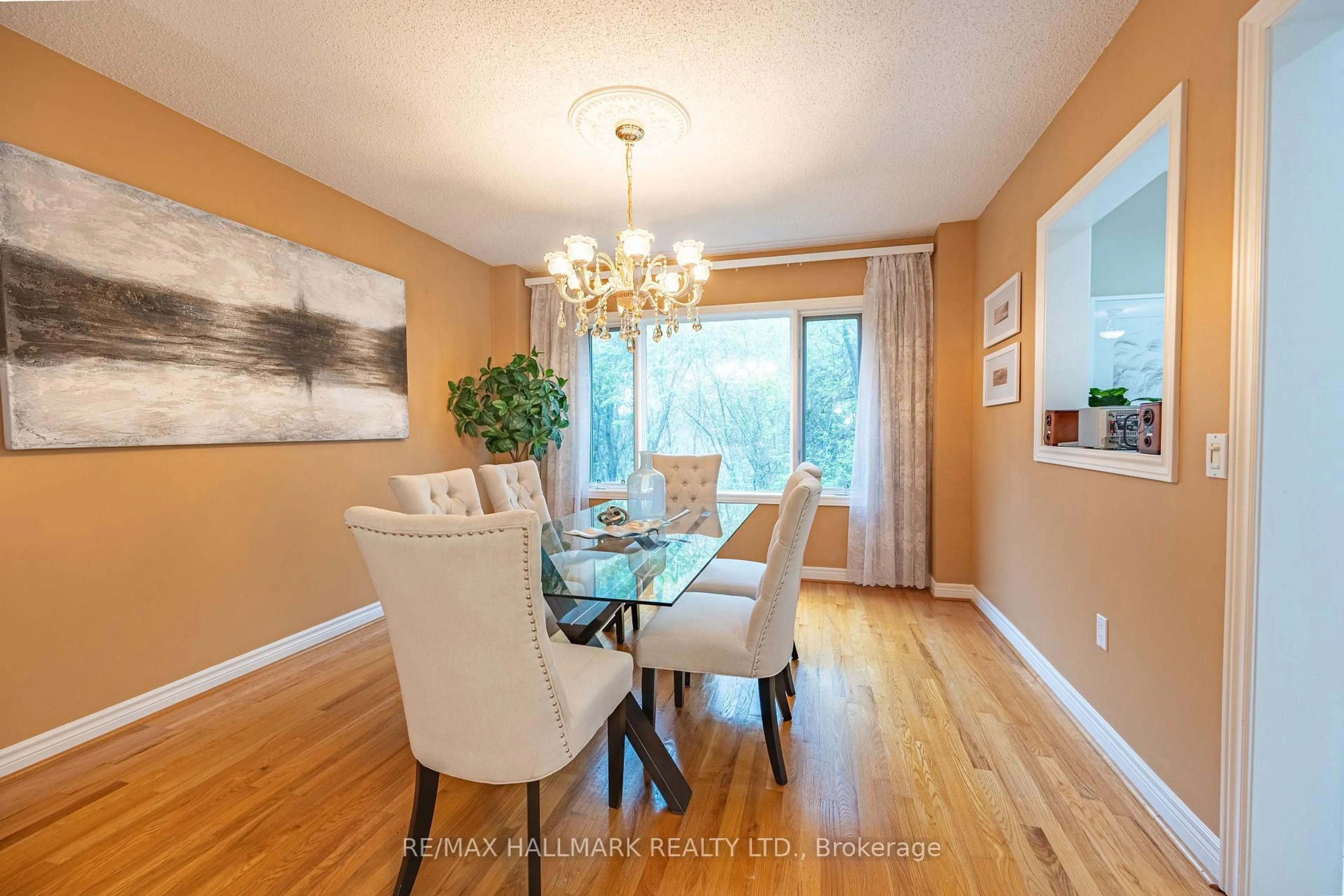 Dining room, wood/laminate floor for 93 Tillie Sq, Markham Ontario L3S 3R8