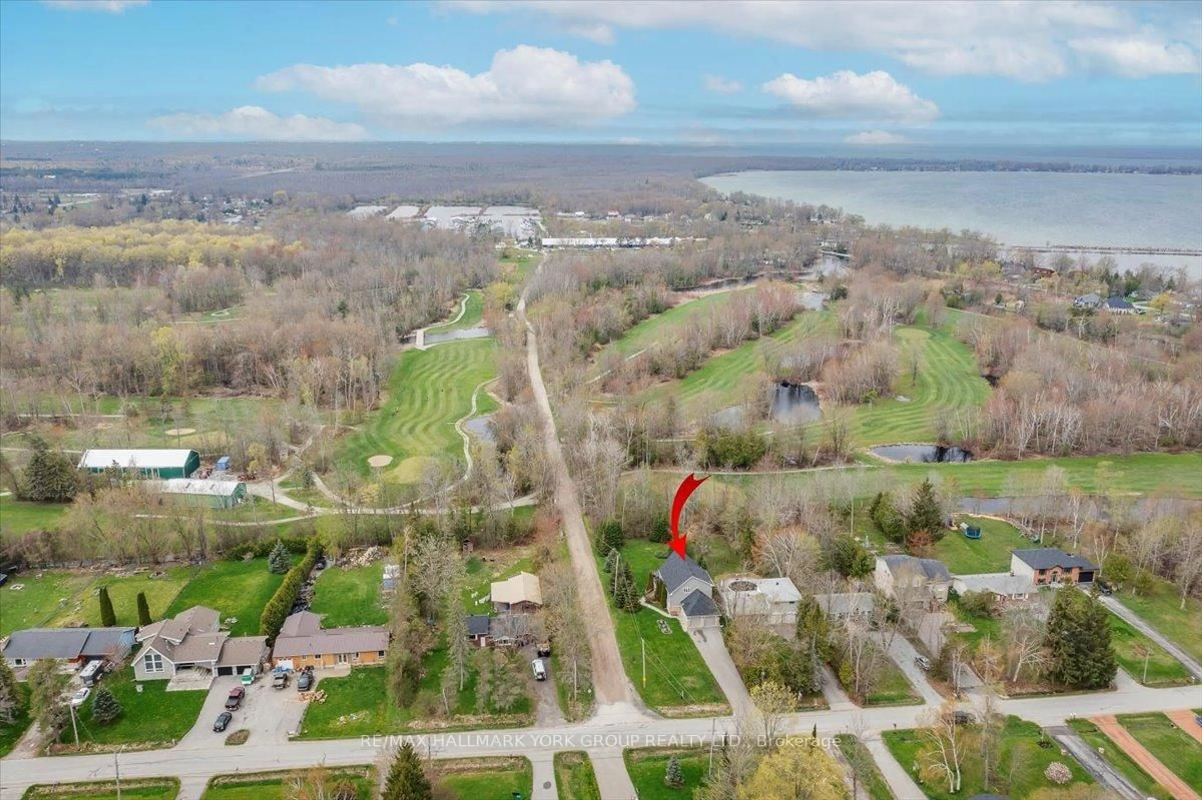 A pic from outside/outdoor area/front of a property/back of a property/a pic from drone, water/lake/river/ocean view for 94 Riverview Beach Rd, Georgina Ontario L0E 1N0