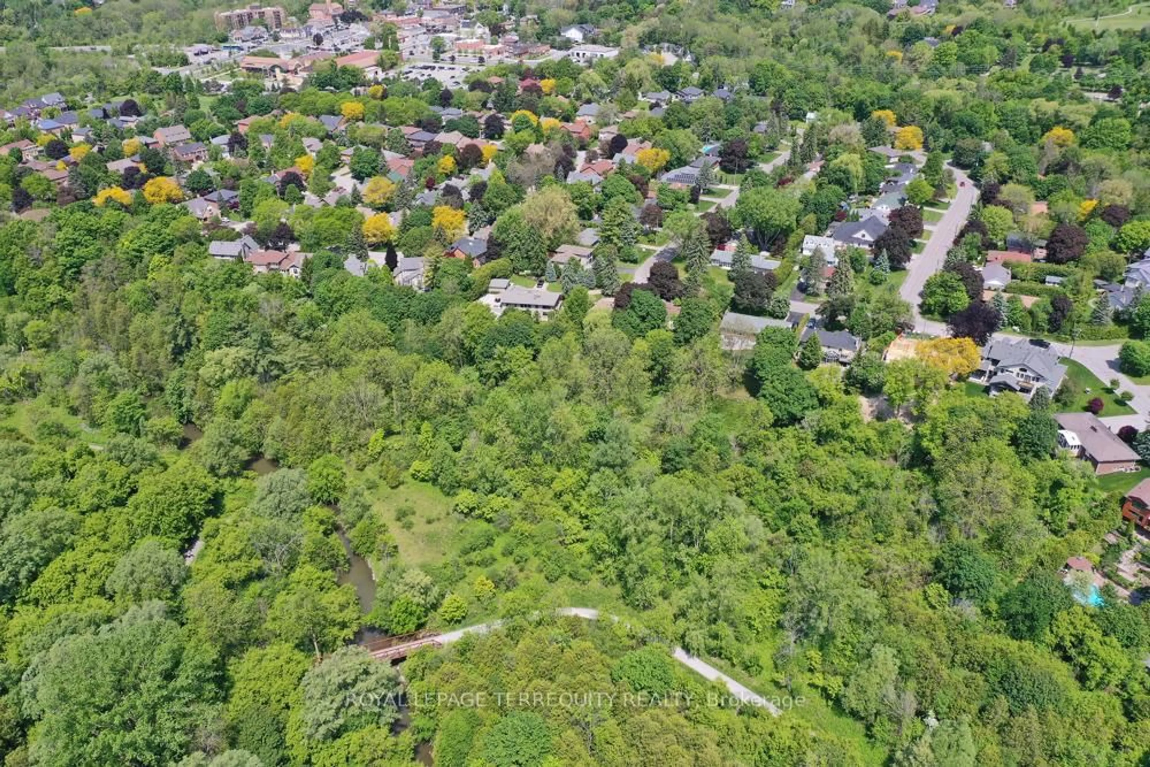 A pic from outside/outdoor area/front of a property/back of a property/a pic from drone, forest/trees view for 20 Paradise Ave, Markham Ontario L3P 3B9