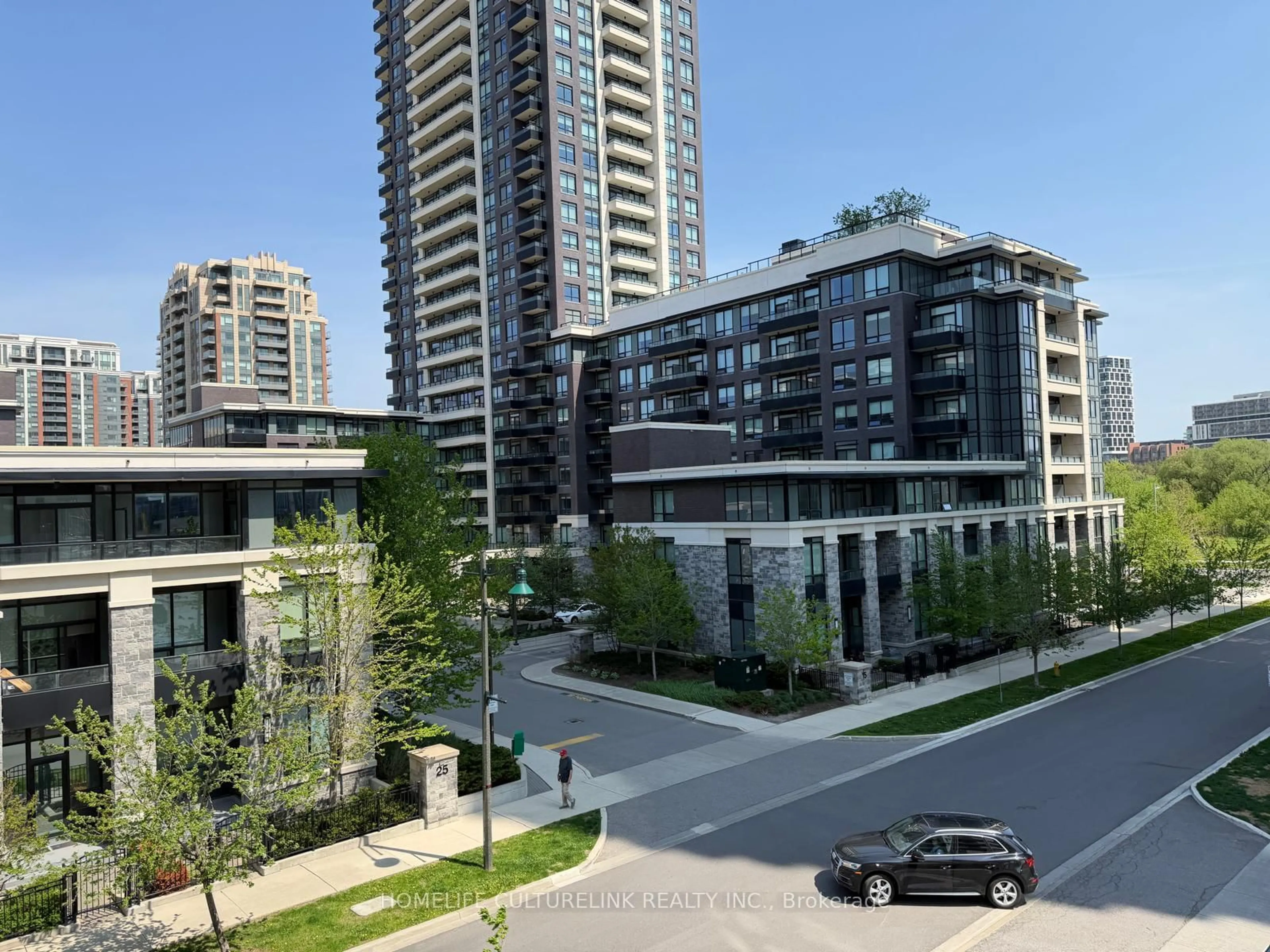 A pic from outside/outdoor area/front of a property/back of a property/a pic from drone, city buildings view from balcony for 38 Water Walk Dr #321, Markham Ontario L3R 6M8