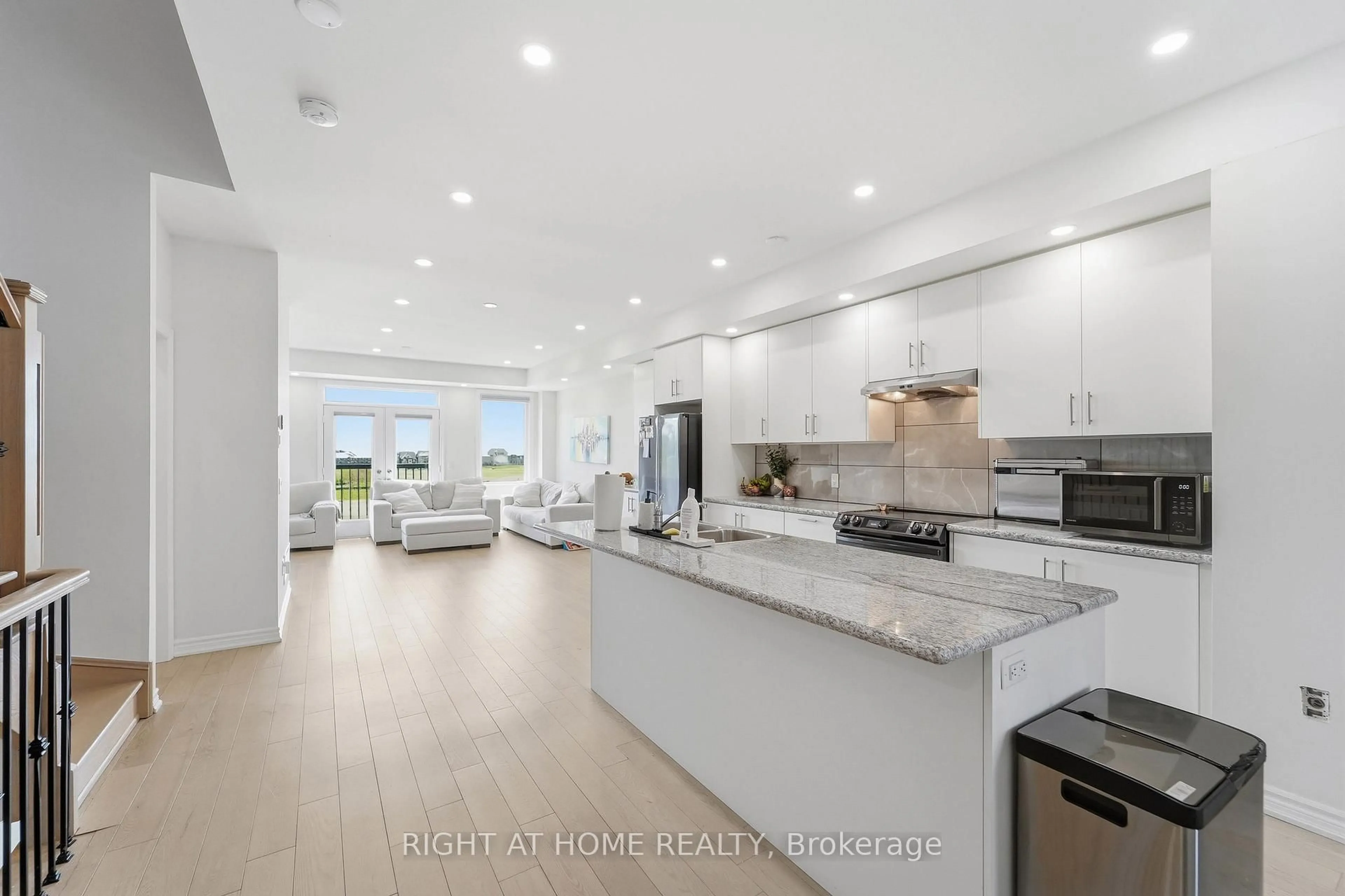 Open concept kitchen, ceramic/tile floor for 75 Puisaya Dr, Richmond Hill Ontario L4E 1L2