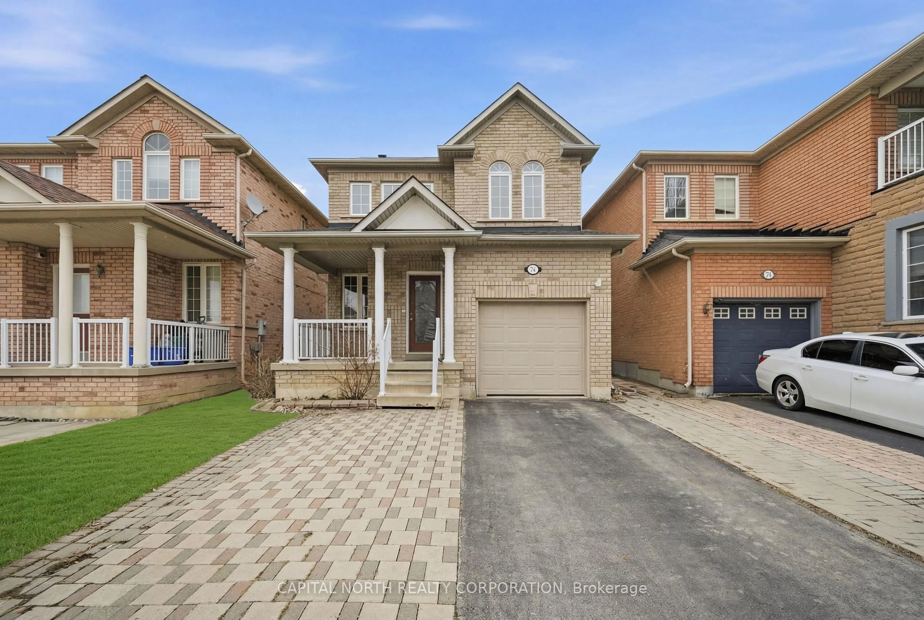 Home with brick exterior material, street for 74 Bullrush Dr, Vaughan Ontario L4H 2V8