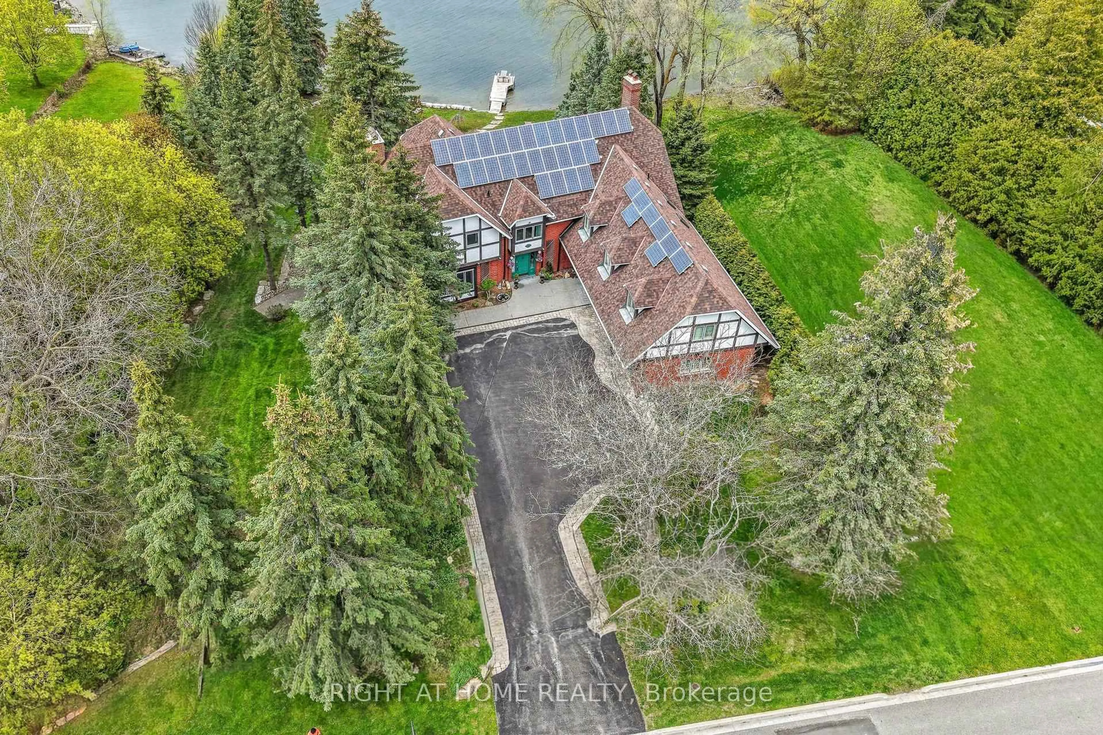 A pic from outside/outdoor area/front of a property/back of a property/a pic from drone, water/lake/river/ocean view for 566 Sunset Beach Rd, Richmond Hill Ontario L4E 3J8