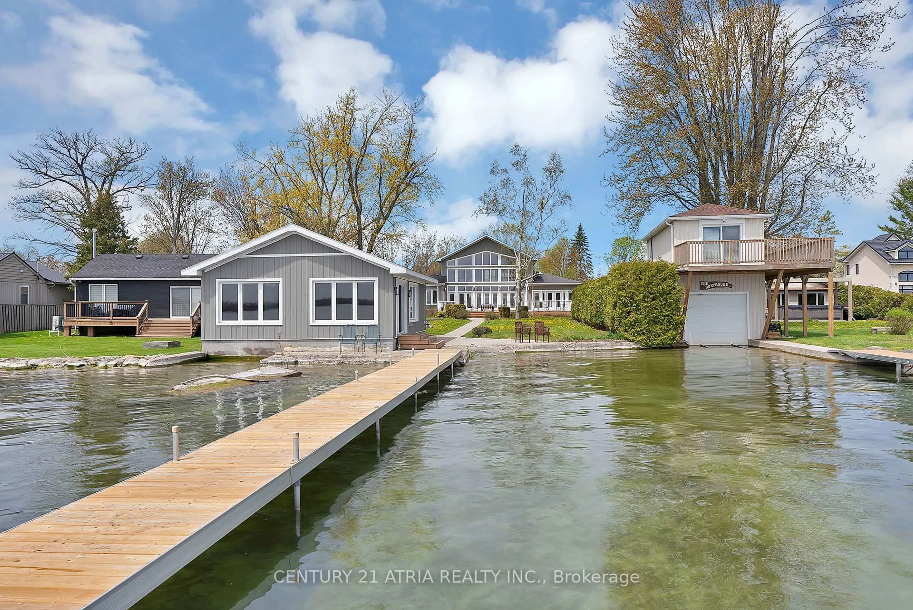 A pic from outside/outdoor area/front of a property/back of a property/a pic from drone, water/lake/river/ocean view for 591 Duclos Point Rd, Georgina Ontario L0E 1N0