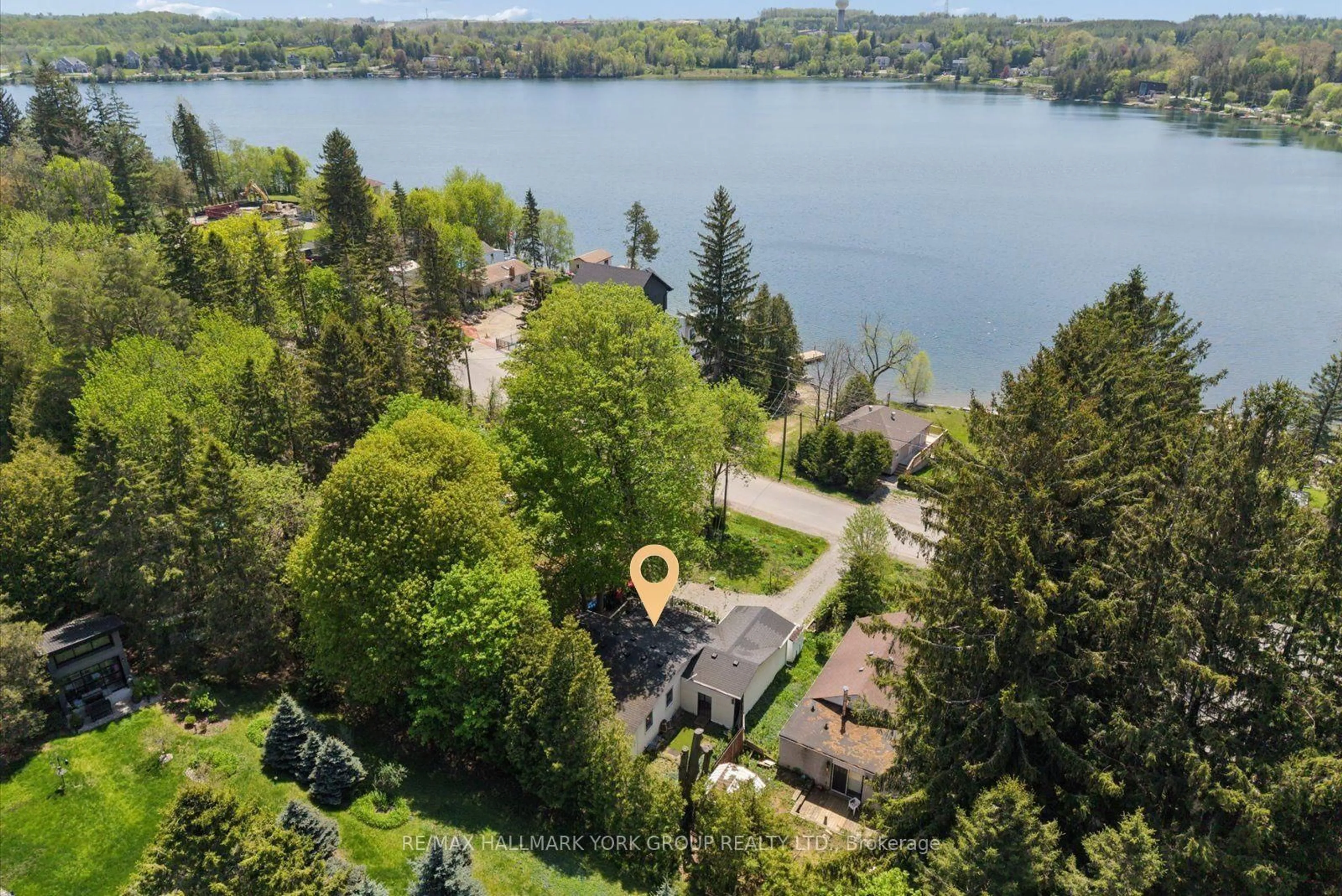 A pic from outside/outdoor area/front of a property/back of a property/a pic from drone, water/lake/river/ocean view for 42 Connor Dr, Whitchurch-Stouffville Ontario L4A 7X3