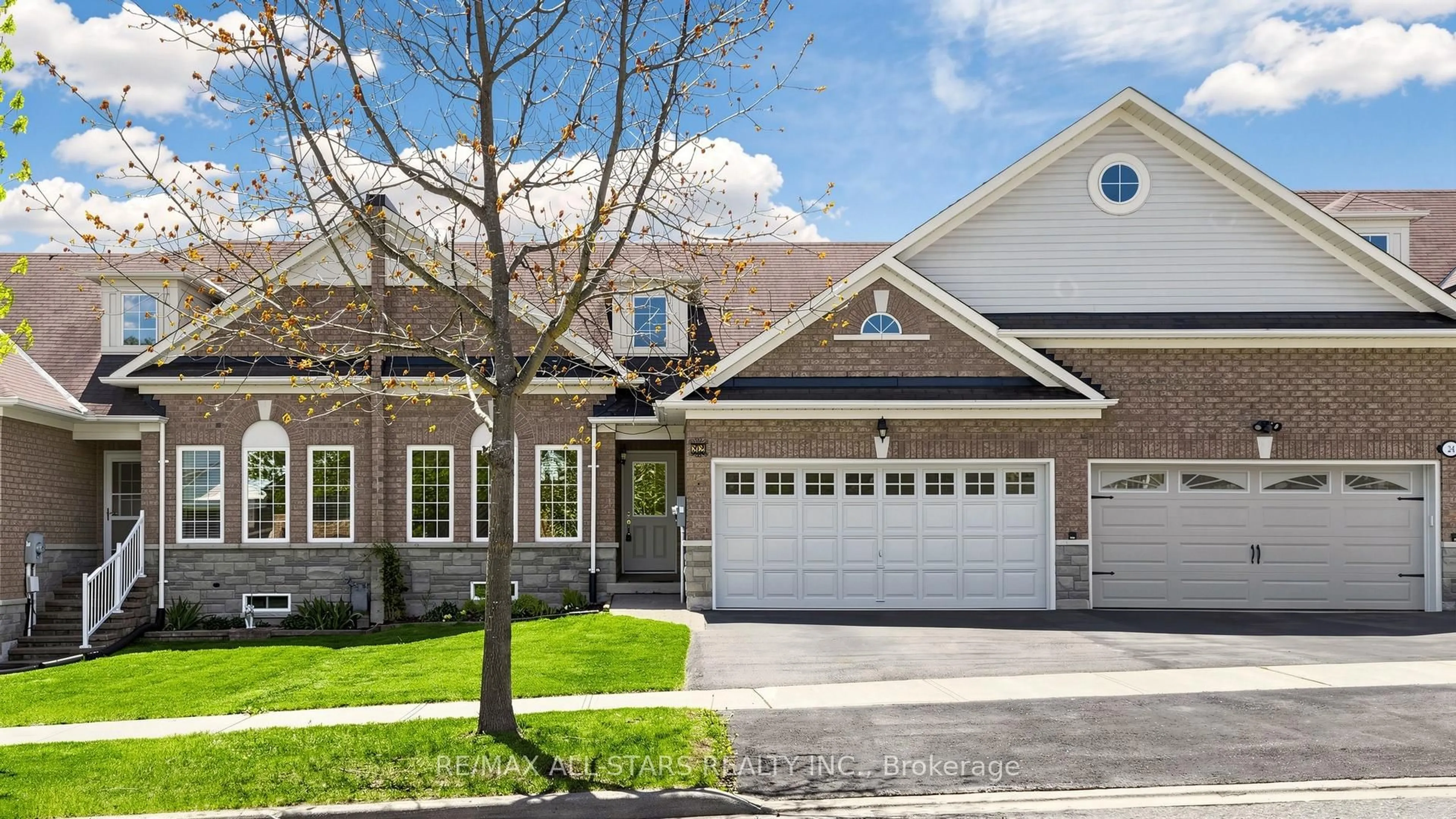 Home with brick exterior material, street for 22 Geo Izatt Dr, Uxbridge Ontario L9P 0A4