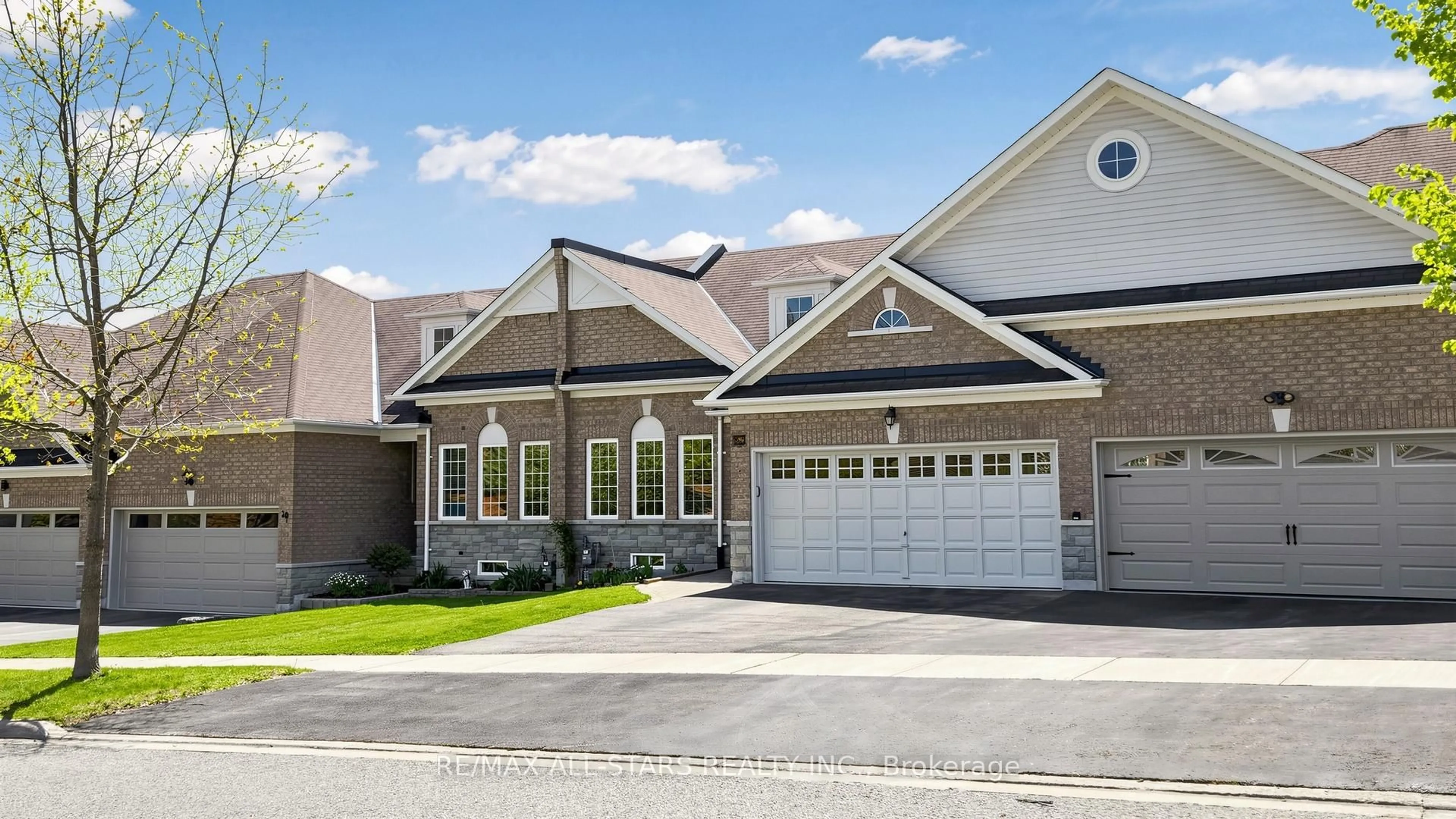 Home with brick exterior material, street for 22 Geo Izatt Dr, Uxbridge Ontario L9P 0A4