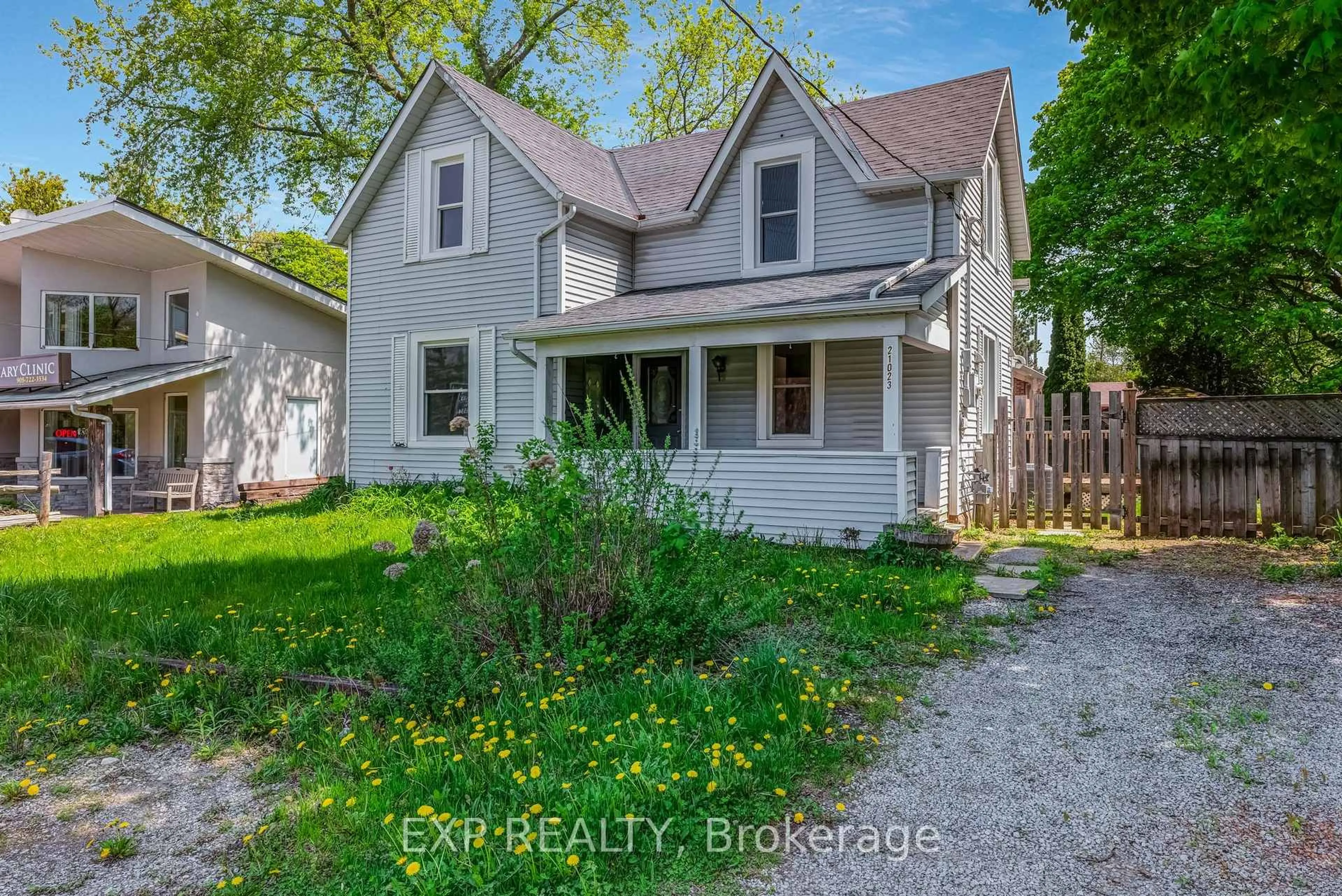 A pic from outside/outdoor area/front of a property/back of a property/a pic from drone, street for 21023 Dalton Rd, Georgina Ontario L0E 1L0