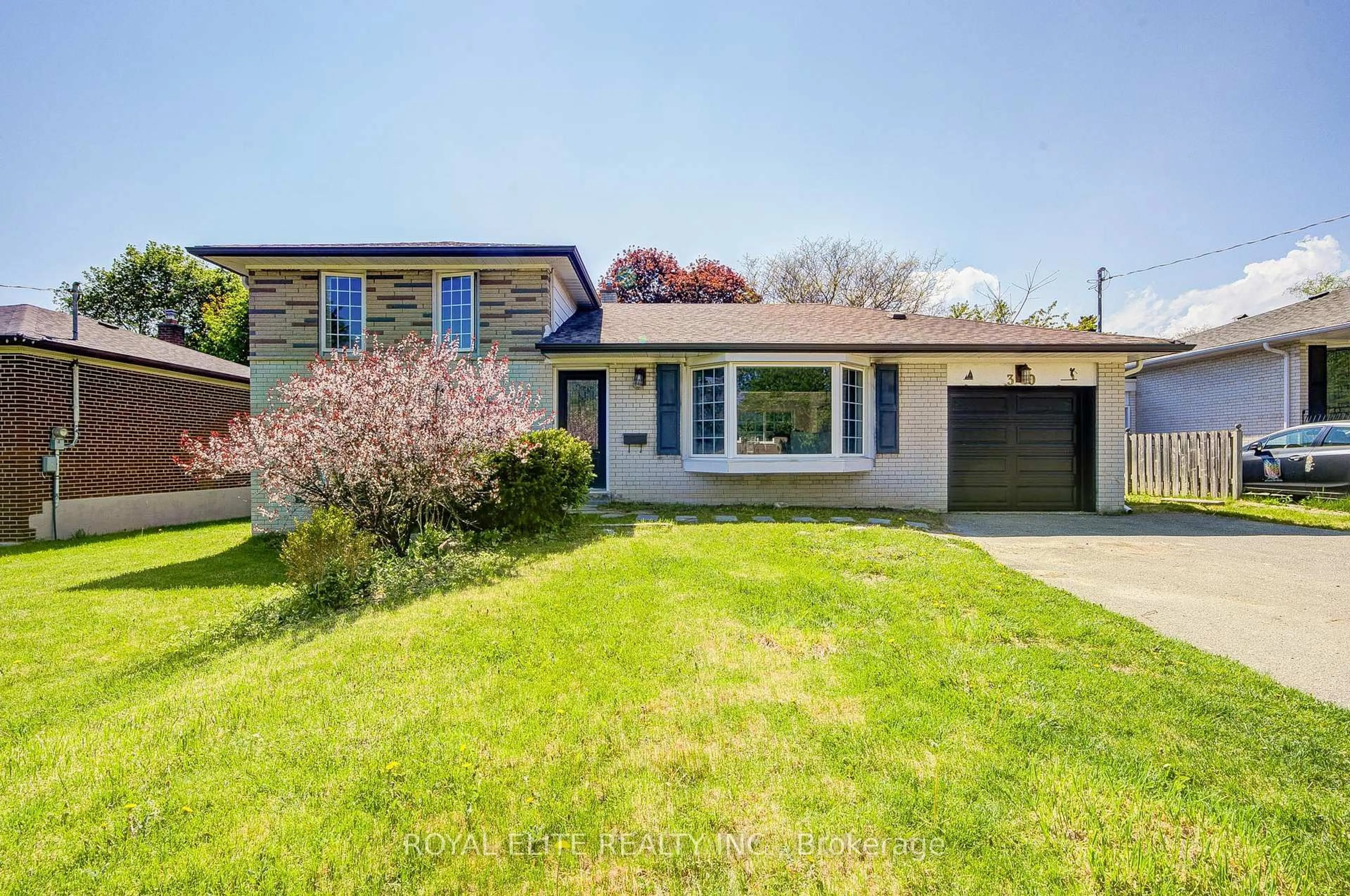 Home with brick exterior material, street for 30 Alanadale Ave, Markham Ontario L3P 1S3
