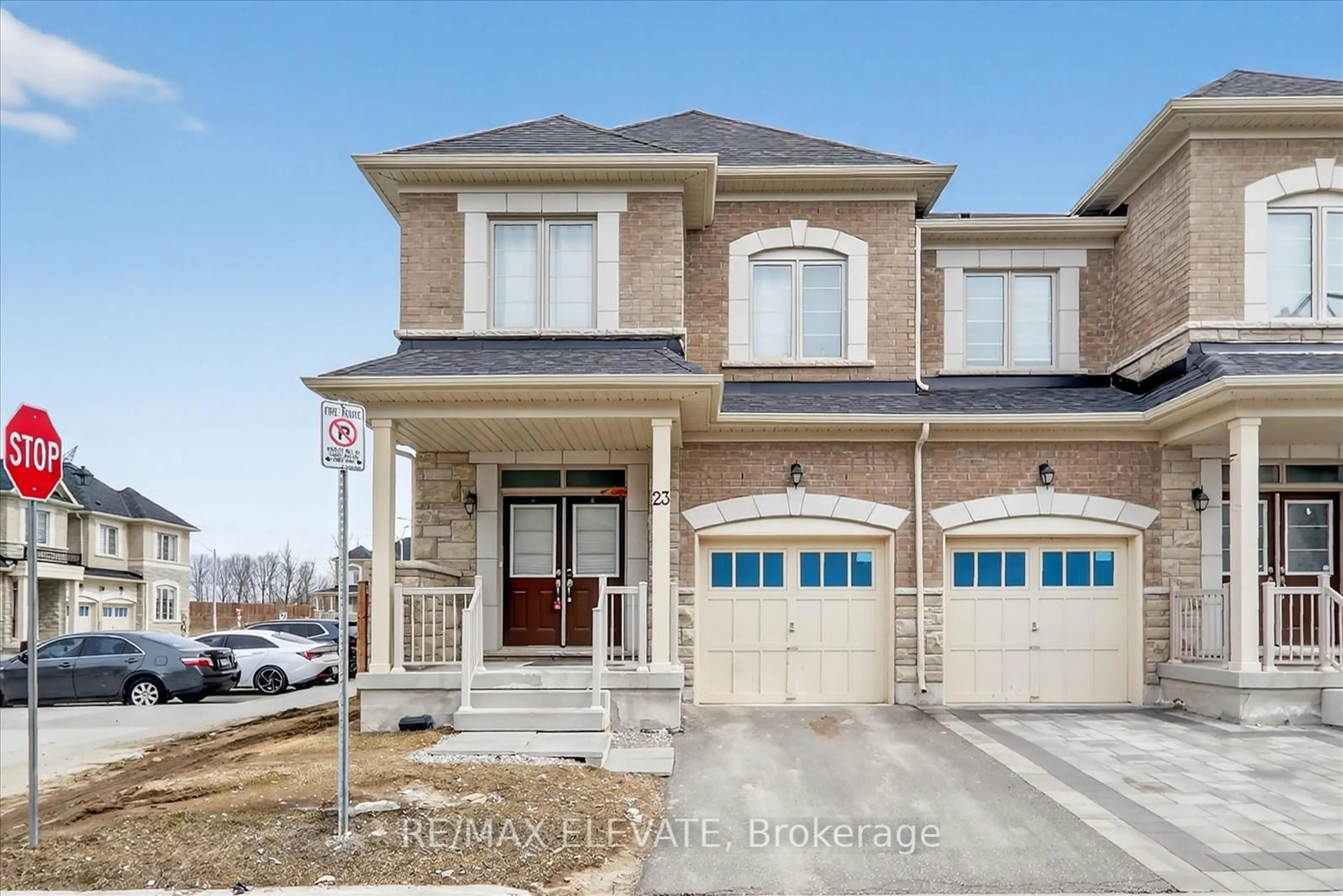 Home with brick exterior material, street for 23 Reign Lane, Markham Ontario L3S 0E8