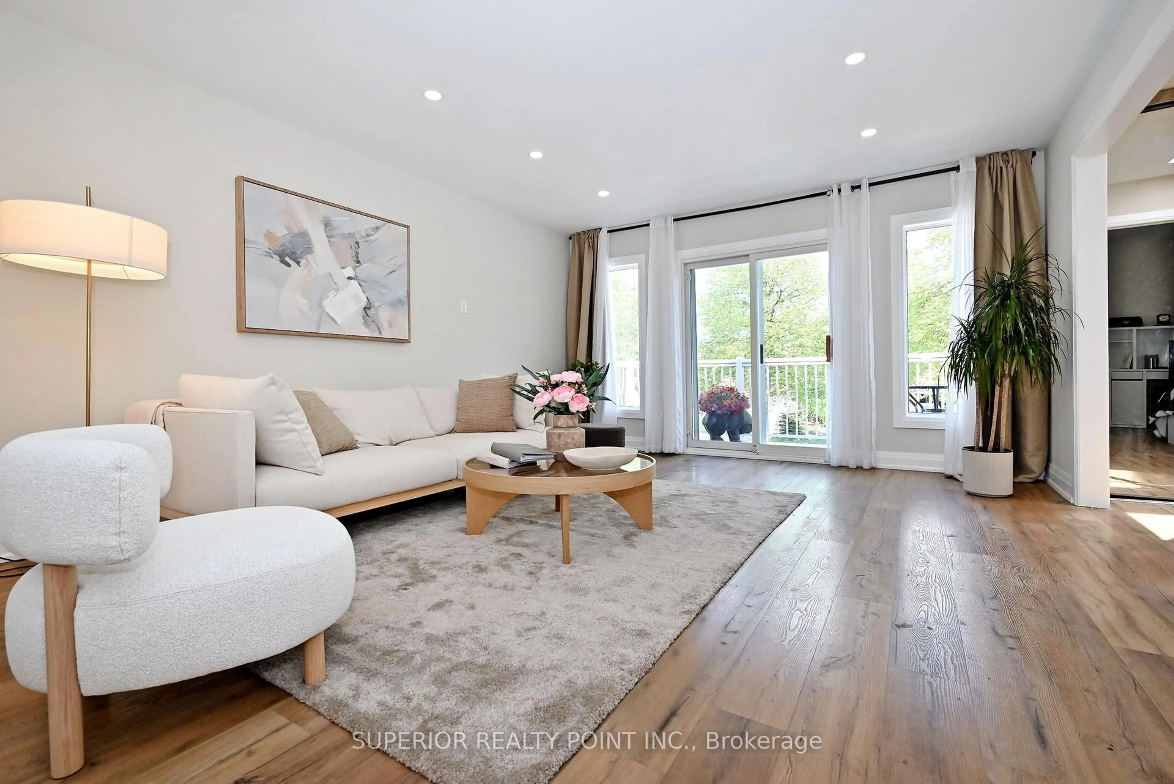 Living room with furniture, wood/laminate floor for 150 Mathewson St, Vaughan Ontario L6A 1B9
