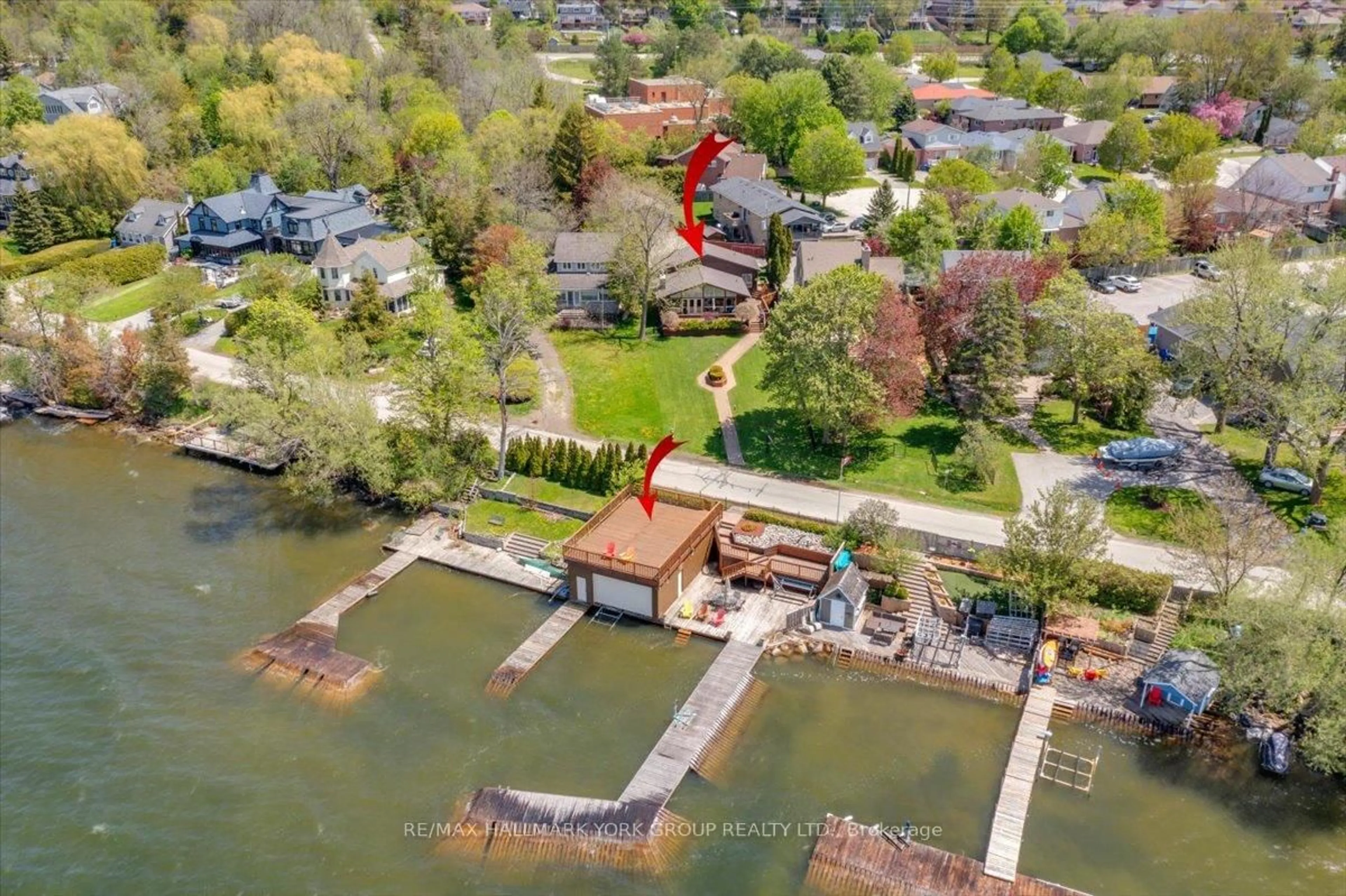 A pic from outside/outdoor area/front of a property/back of a property/a pic from drone, water/lake/river/ocean view for 229 Lake Dr, Georgina Ontario L4P 3C8