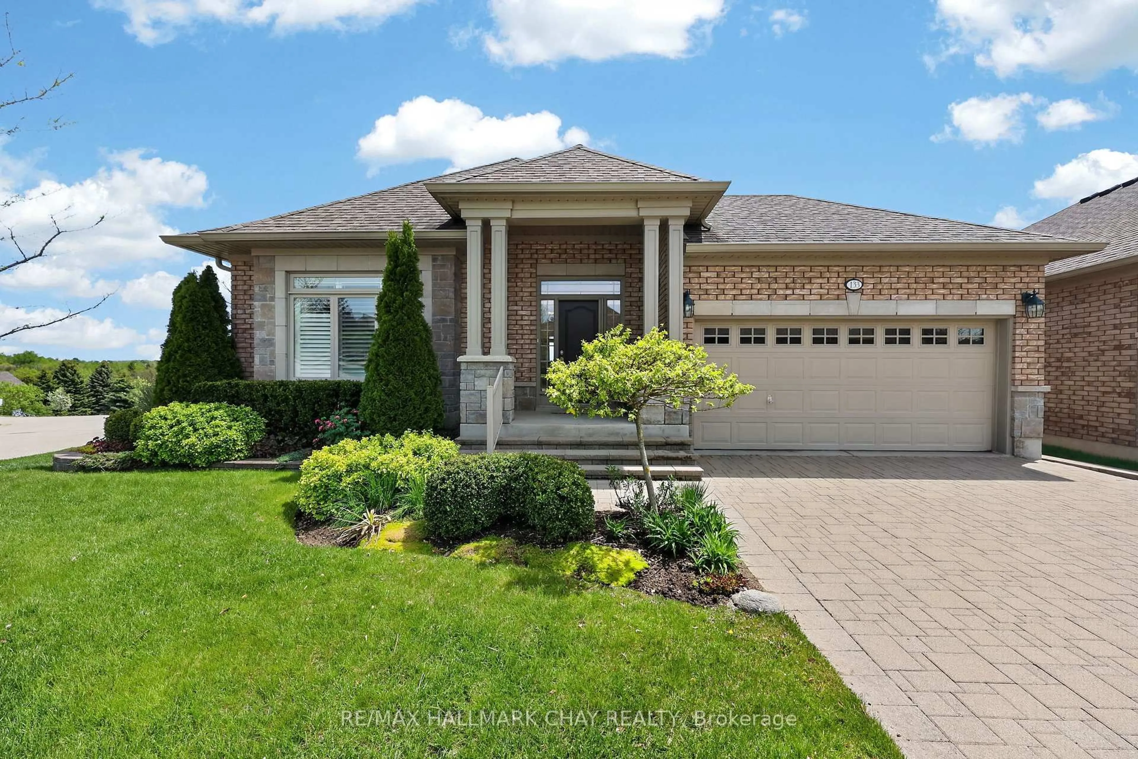Home with brick exterior material, street for 133 Ridge Way #26, New Tecumseth Ontario L9R 0M6