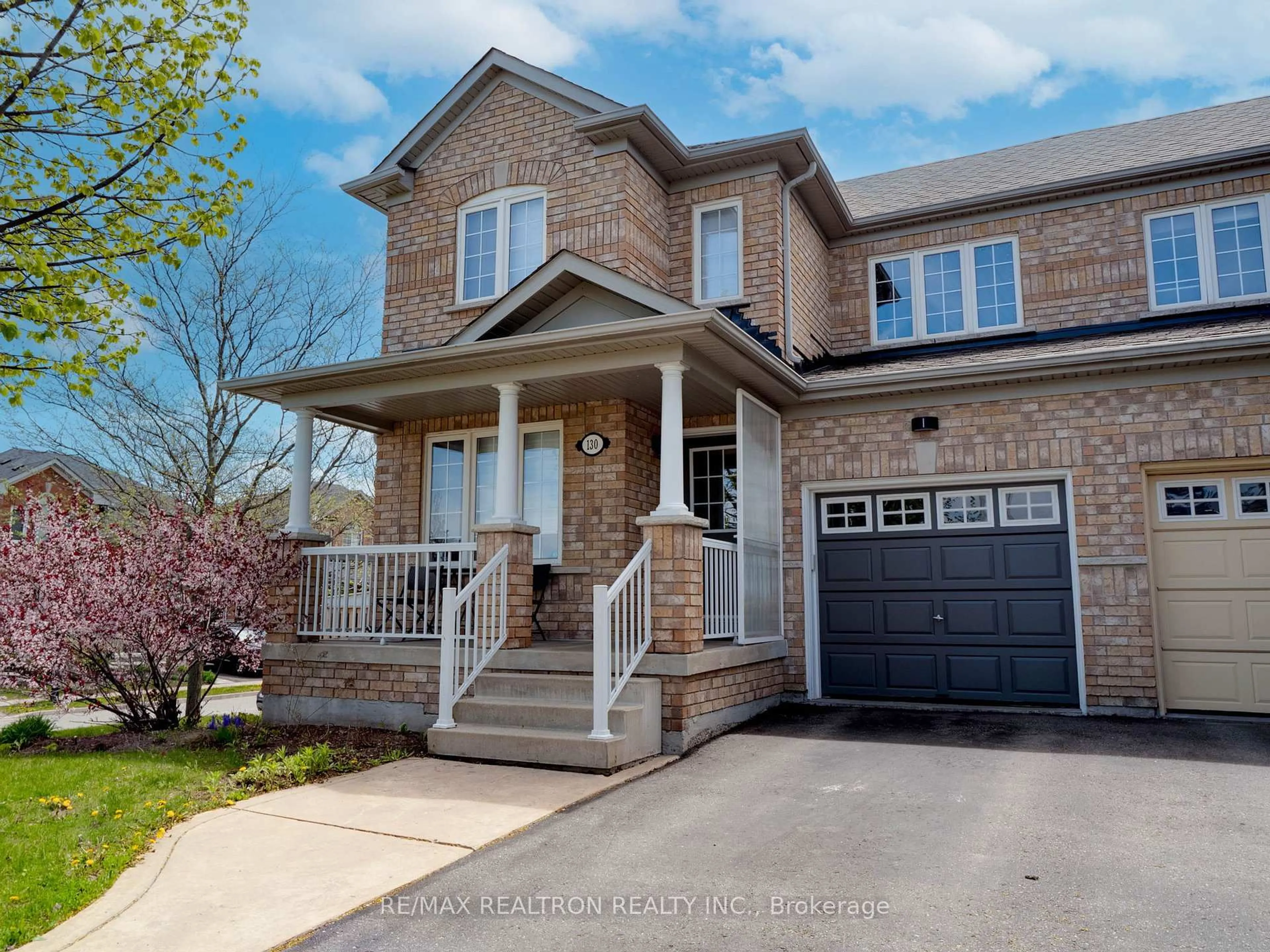 Home with brick exterior material, street for 130 Aspenwood Dr, Newmarket Ontario L3X 2X6
