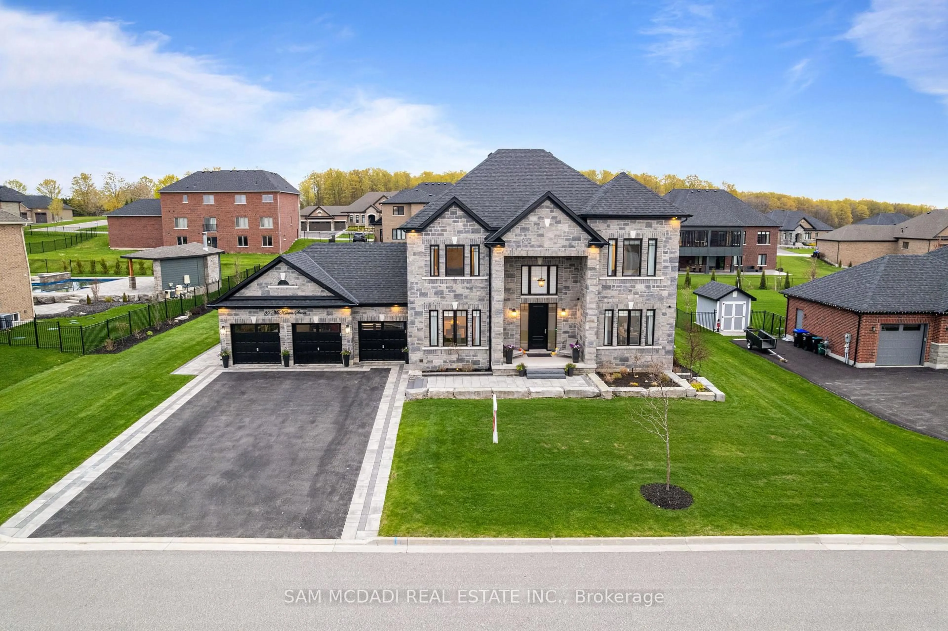 A pic from outside/outdoor area/front of a property/back of a property/a pic from drone, street for 39 Mckeown St, Essa Ontario L0L 2N0