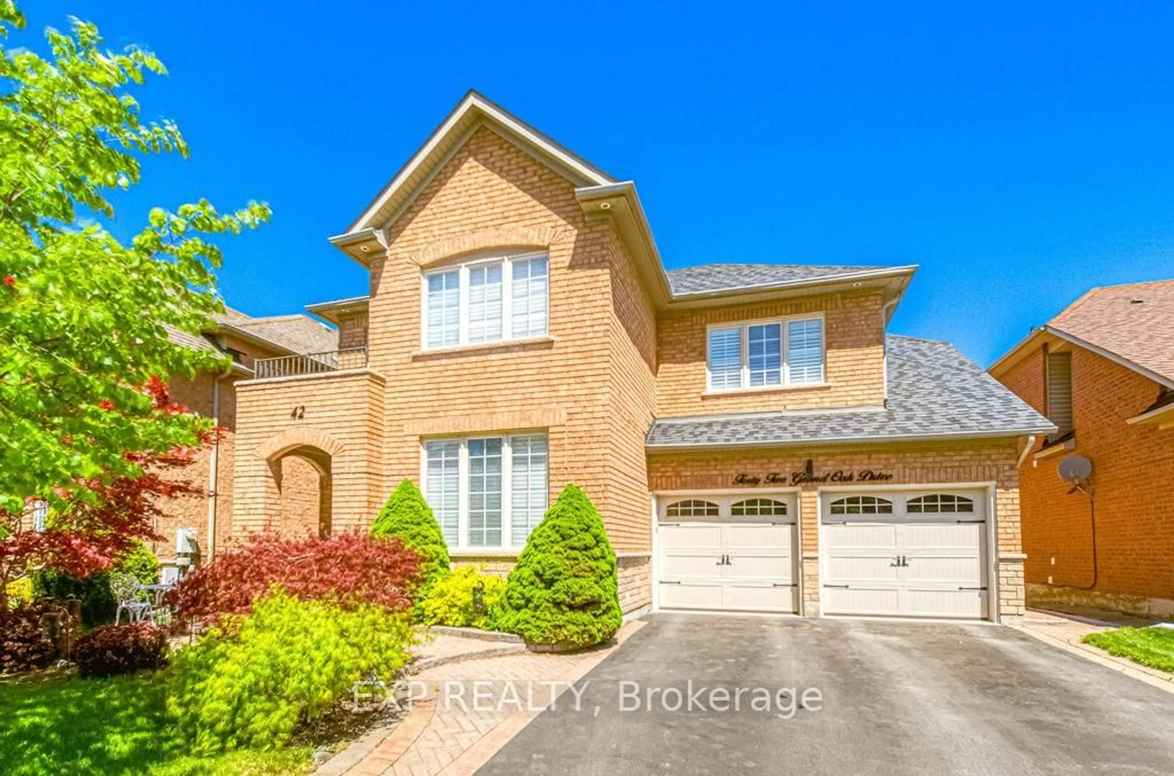 Home with brick exterior material, street for 42 Grand Oak Dr, Richmond Hill Ontario L4E 3Z9