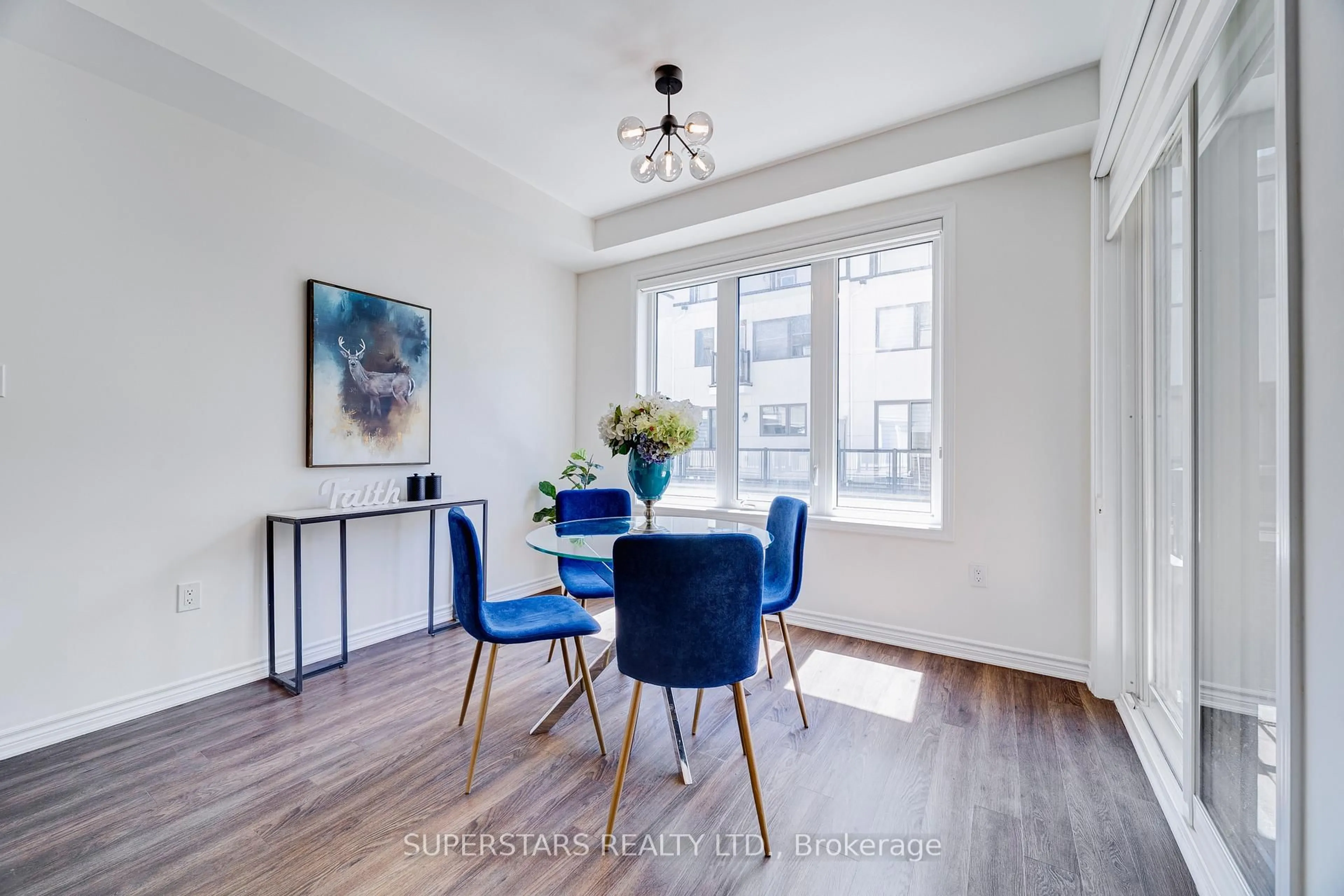 Dining room, wood/laminate floor for 241 Rustle Woods Ave, Markham Ontario L6B 1M7