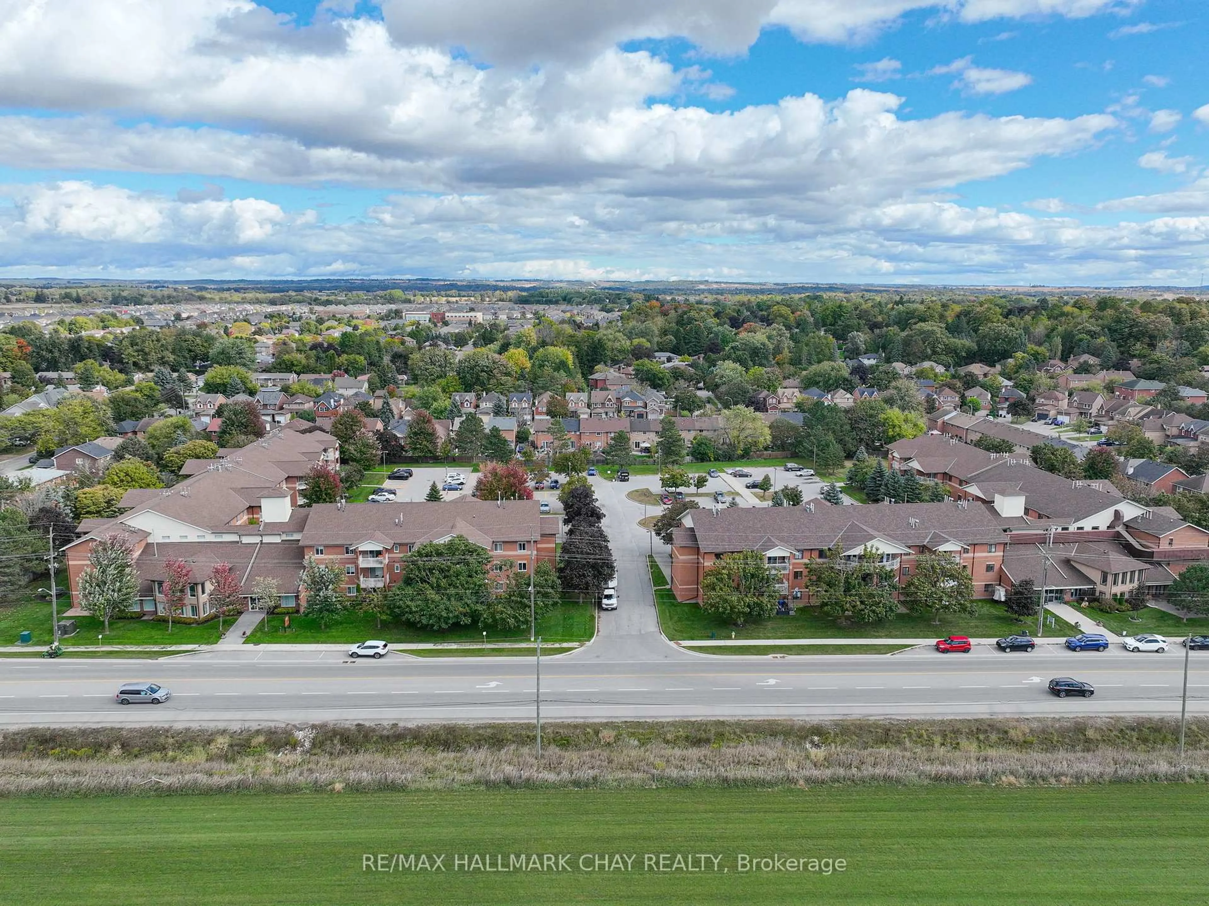 A pic from outside/outdoor area/front of a property/back of a property/a pic from drone, city buildings view from balcony for 247 King St #215, New Tecumseth Ontario L9R 1N4