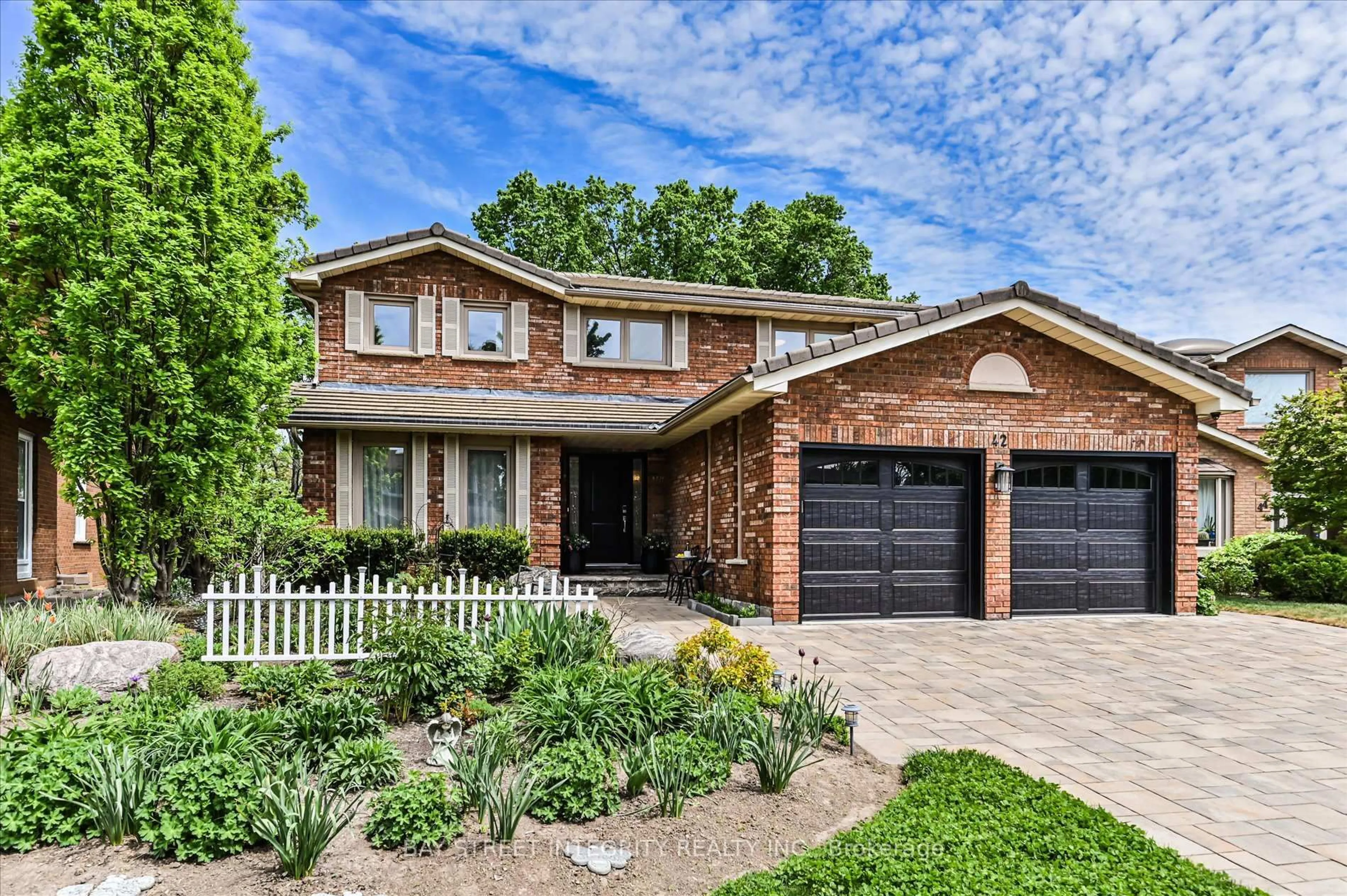 Home with brick exterior material, street for 42 Sycamore Dr, Markham Ontario L3T 5V6