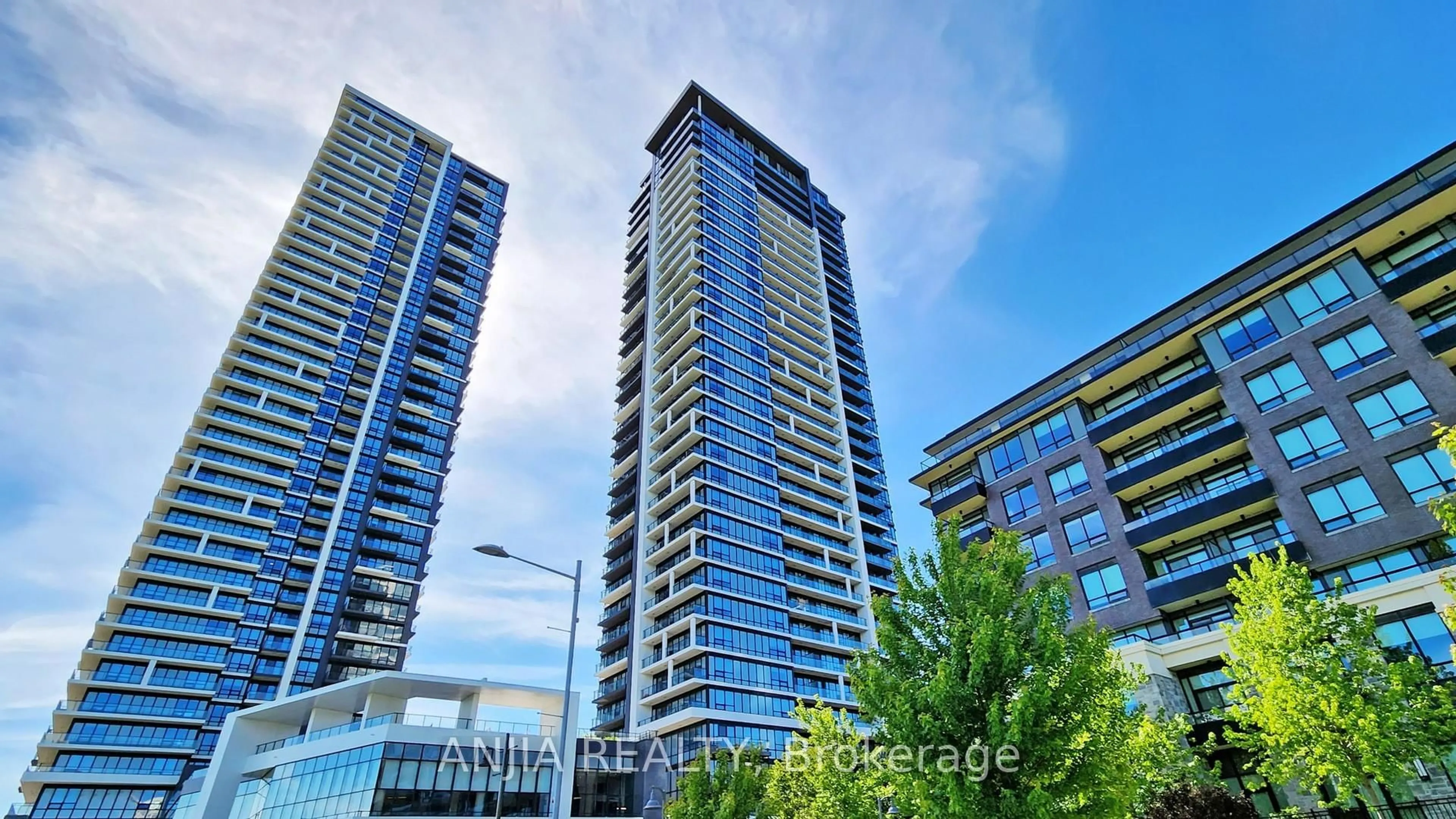 A pic from outside/outdoor area/front of a property/back of a property/a pic from drone, city buildings view from balcony for 18 Water Walk Dr #3106, Markham Ontario L3R 6L5