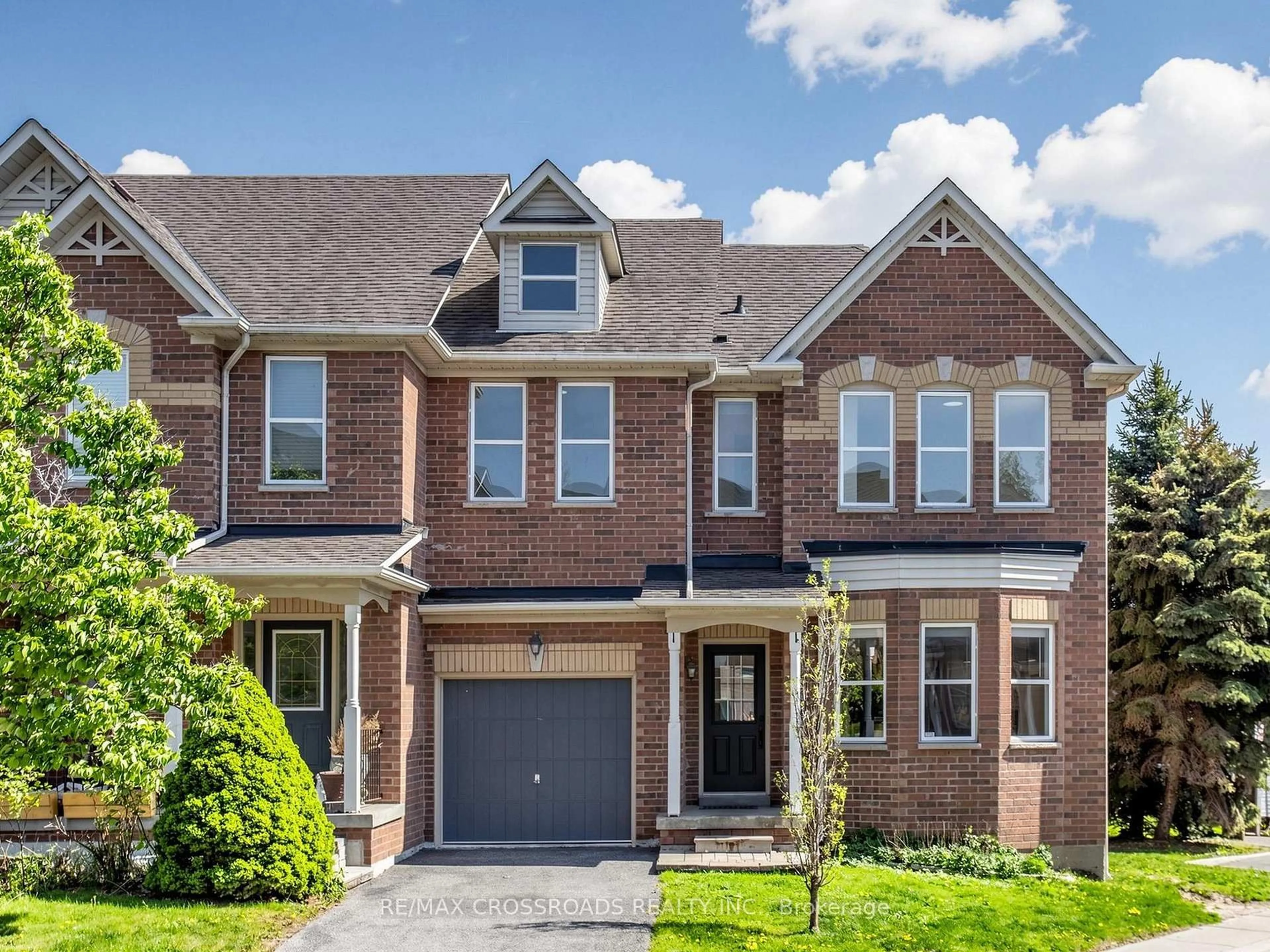 Home with brick exterior material, street for 52 DREW KELLY Way, Markham Ontario L3R 5R2