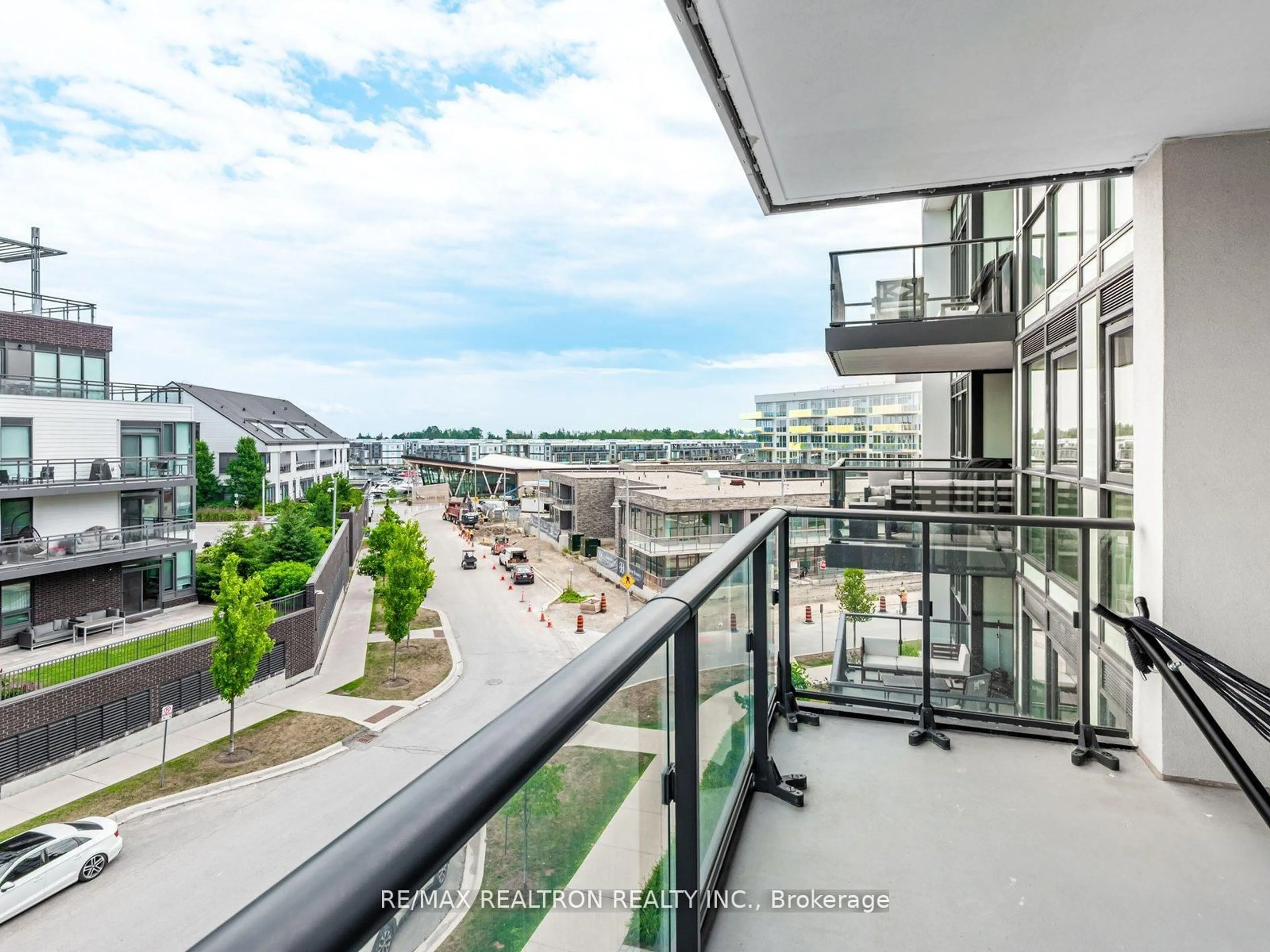 Balcony in the apartment, city buildings view from balcony for 375 Sea Ray Ave #315, Innisfil Ontario L9S 0N9