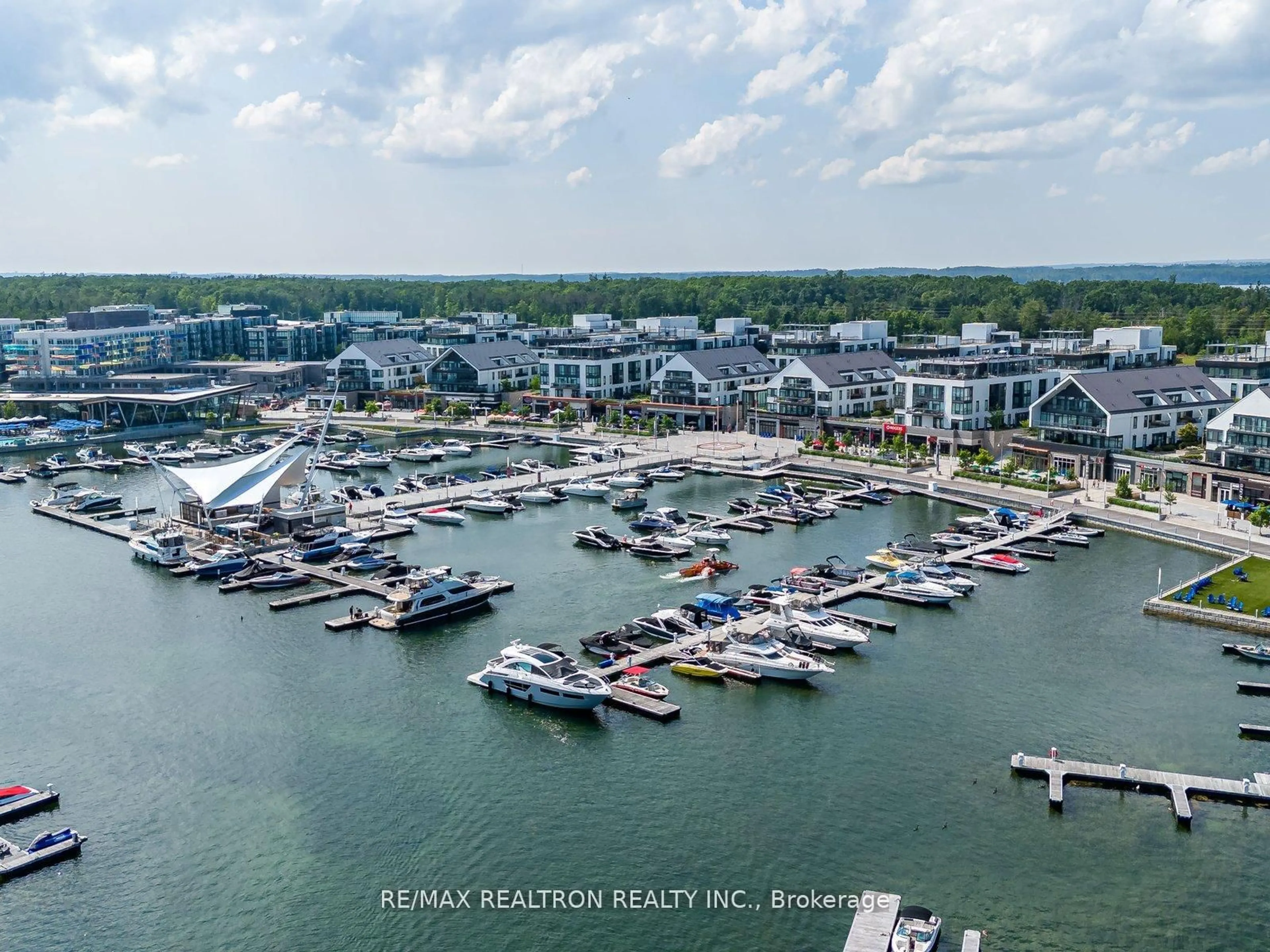 A pic from outside/outdoor area/front of a property/back of a property/a pic from drone, water/lake/river/ocean view for 375 Sea Ray Ave #315, Innisfil Ontario L9S 0N9