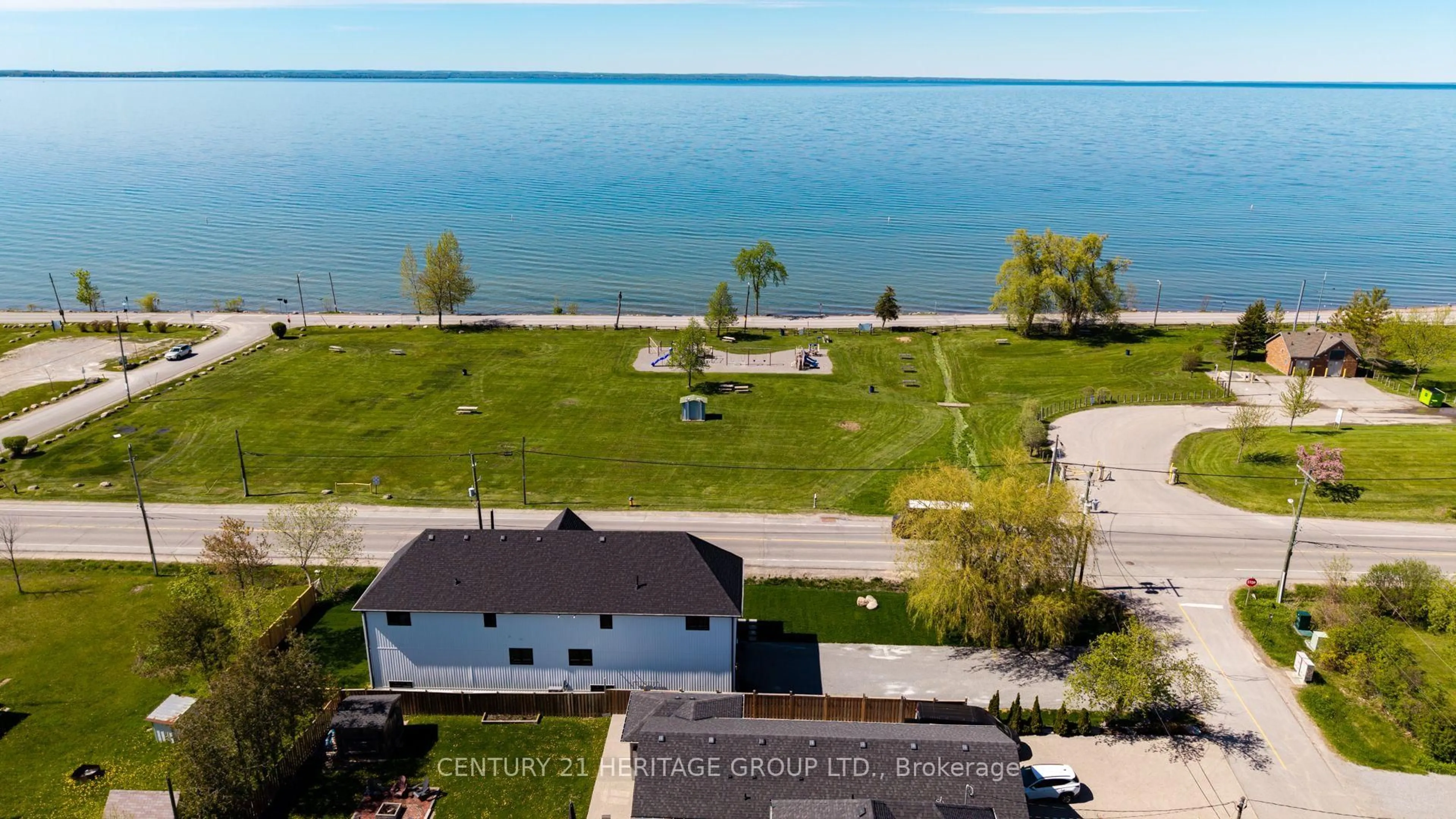 A pic from outside/outdoor area/front of a property/back of a property/a pic from drone, water/lake/river/ocean view for 802 Willowview Dr, Georgina Ontario L0E 1S0
