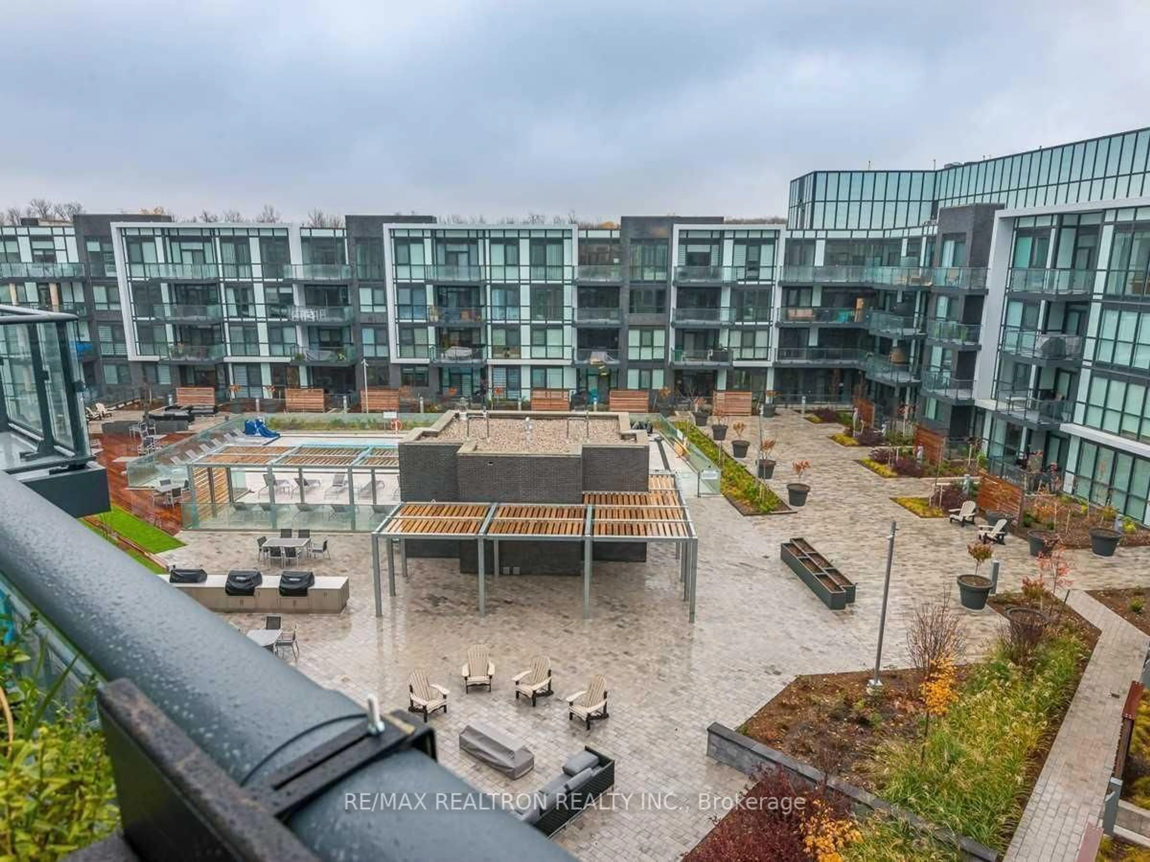 A pic from outside/outdoor area/front of a property/back of a property/a pic from drone, city buildings view from balcony for 375 Sea Ray Ave #424, Innisfil Ontario L9S 0N9
