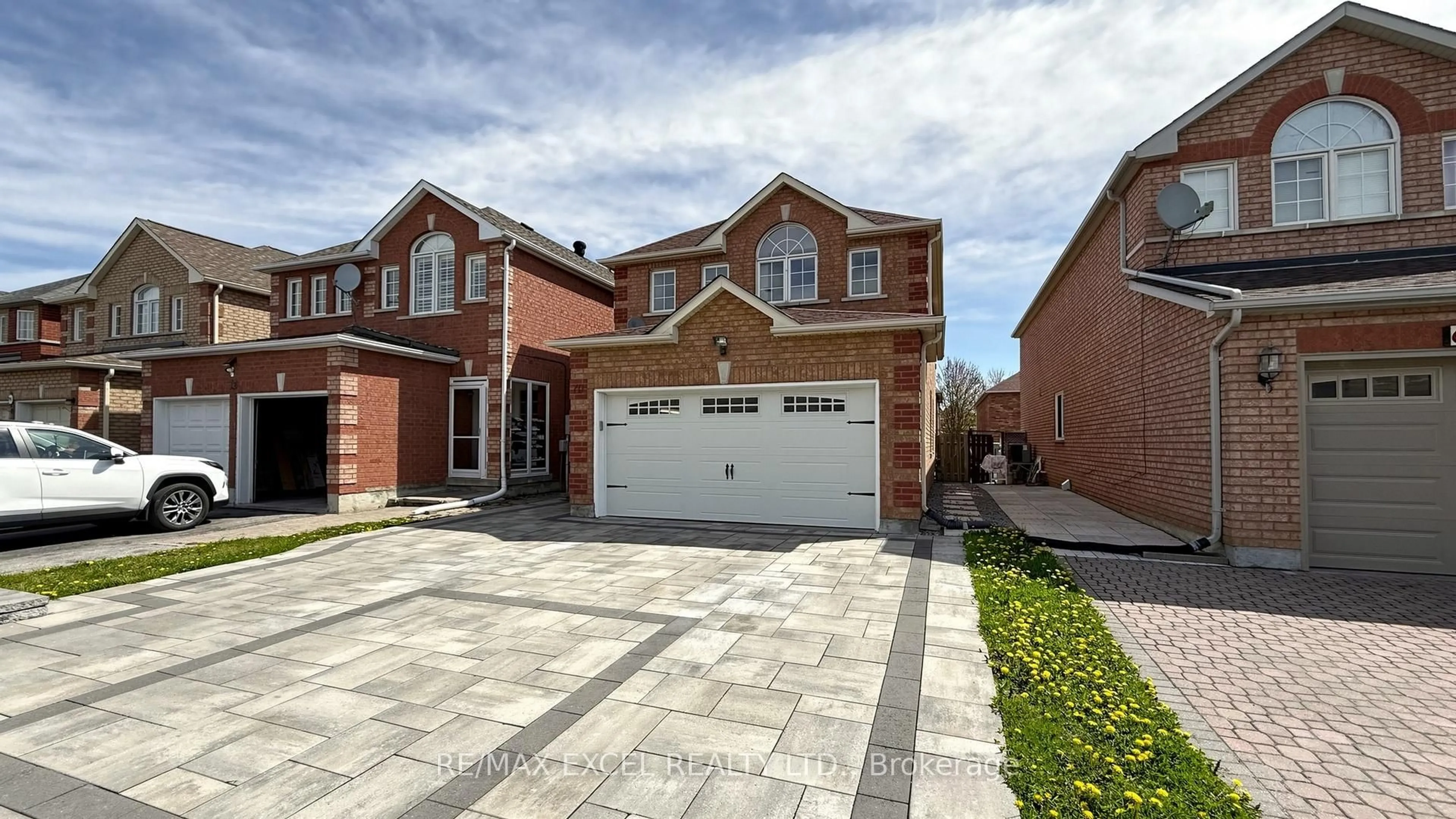Home with brick exterior material, street for 70 Stella Dr, Markham Ontario L3S 4G8