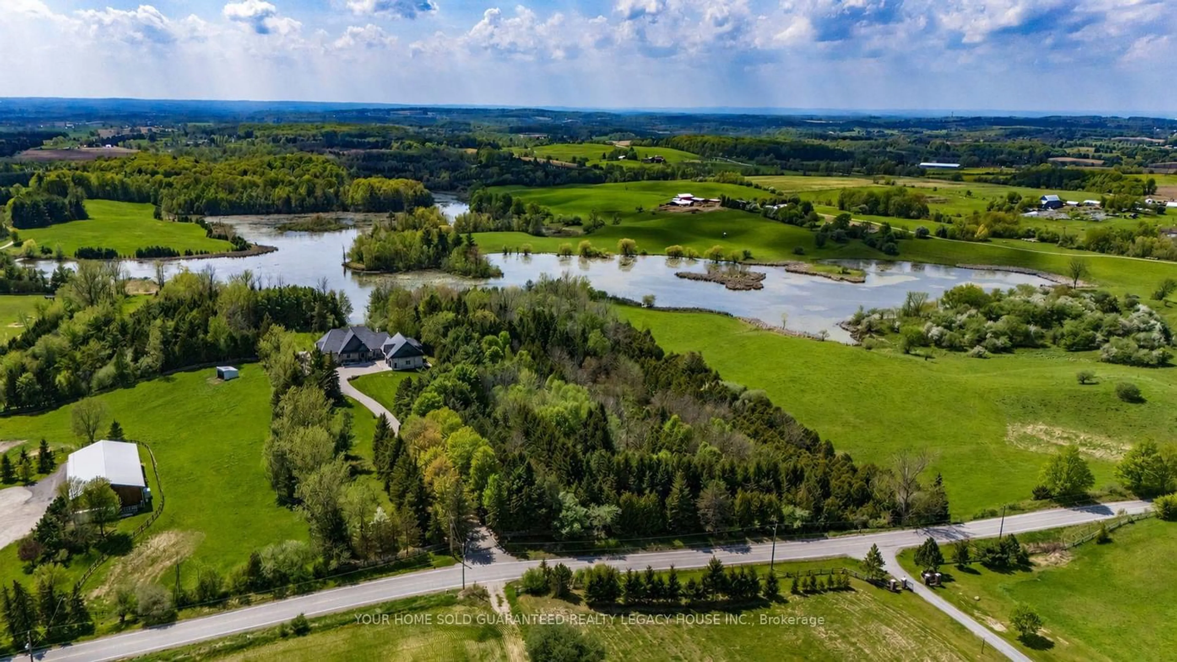 A pic from outside/outdoor area/front of a property/back of a property/a pic from drone, water/lake/river/ocean view for 15670 10th Concession Rd, King Ontario L0G 1T0